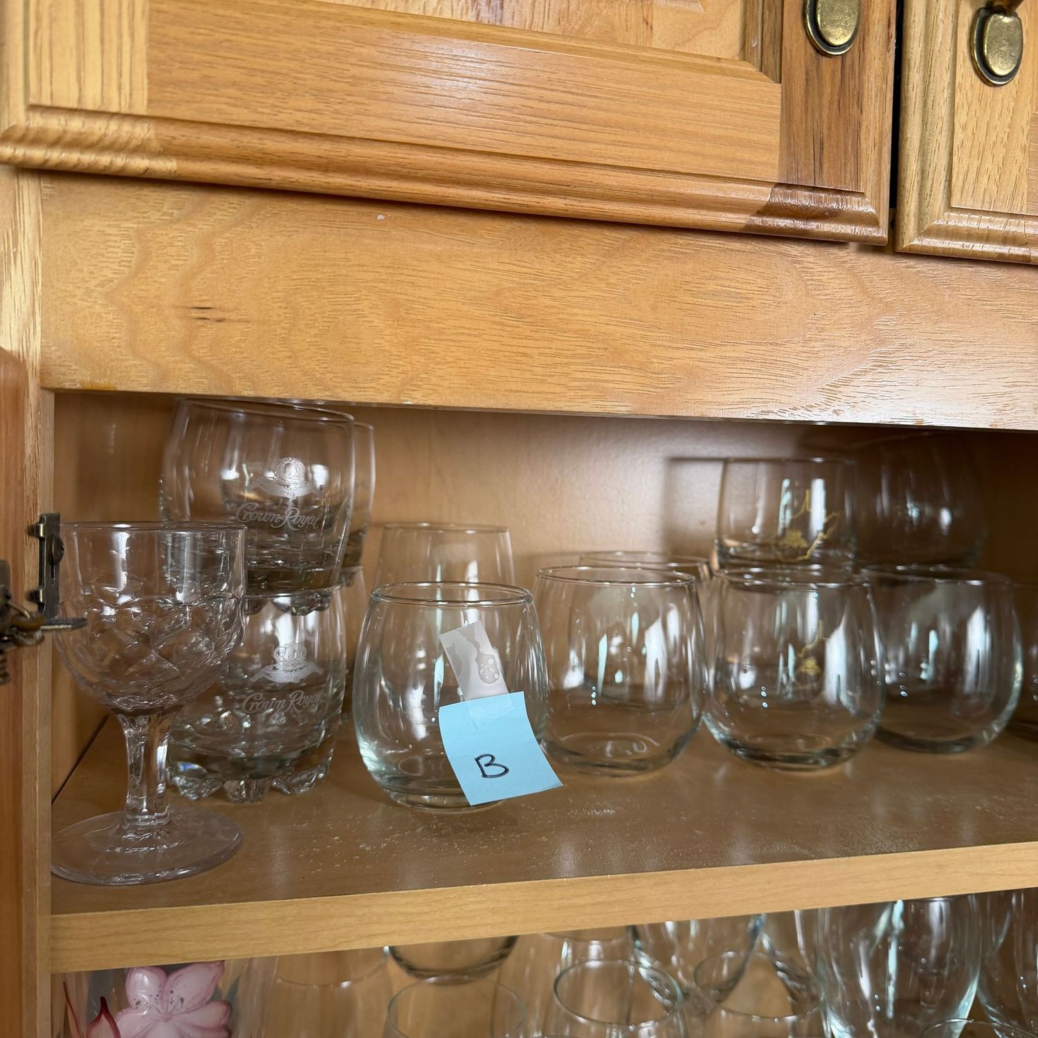 Kitchenware Lot B, shelf of mostly highball and juice glasses Kitchenware Lot B, shelf of mostly highball and juice glasses