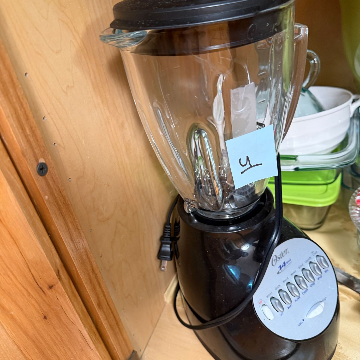 Kitchenware Lot U, Cabinet with mixing bowls, measuring cups, small crock pot, glass storage containers, mixer & more Kitchenware Lot U, Cabinet with mixing bowls, measuring cups, small crock pot, glass storage containers, mixer & more