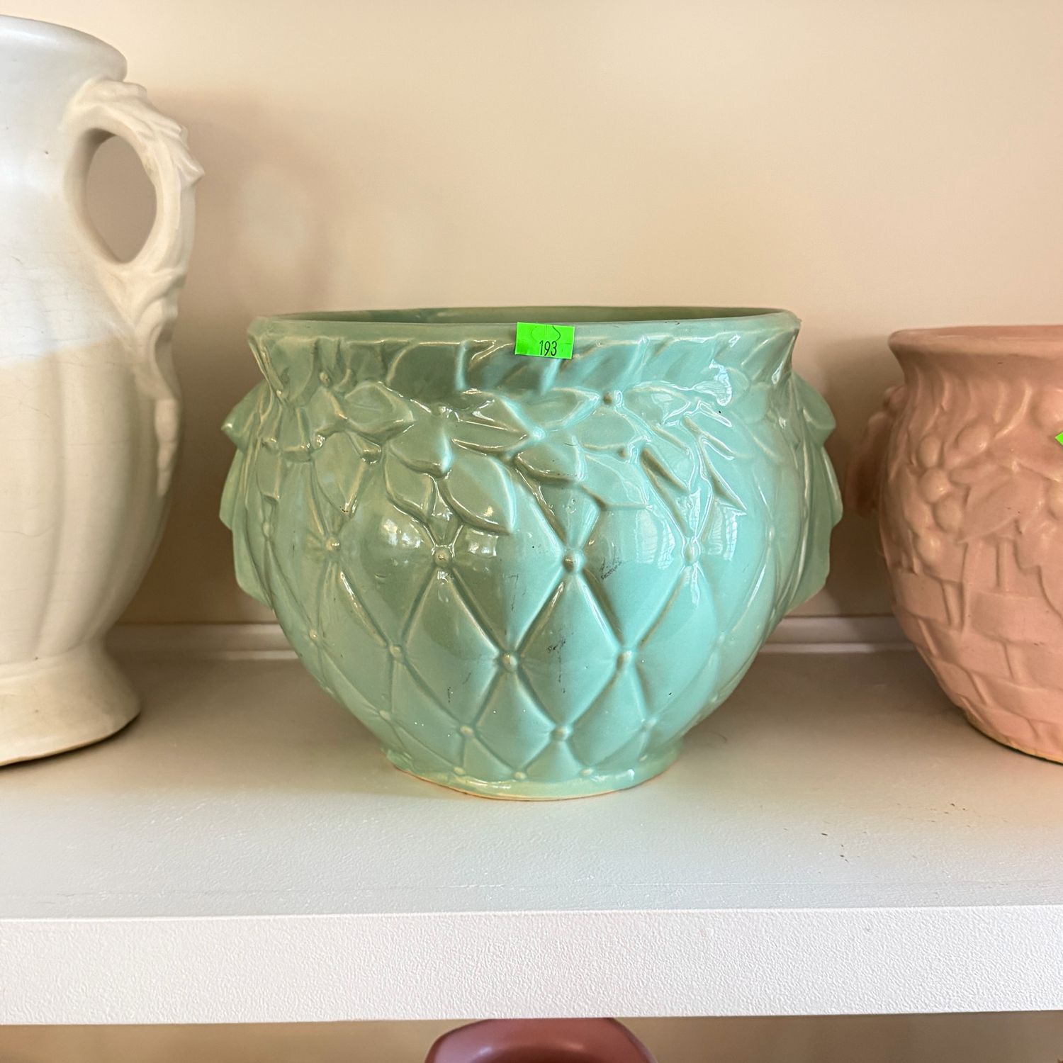 Lot #193, McCoy pottery green quilted jardiniere, 7”H x 11”W