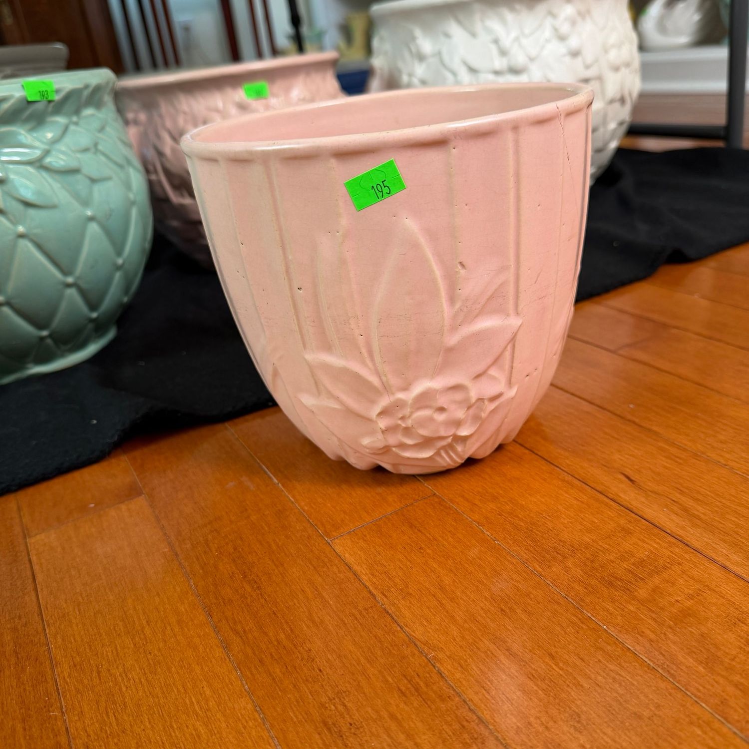 Lot #195, pink McCoy pottery lotus planter, thin hairline, 7"