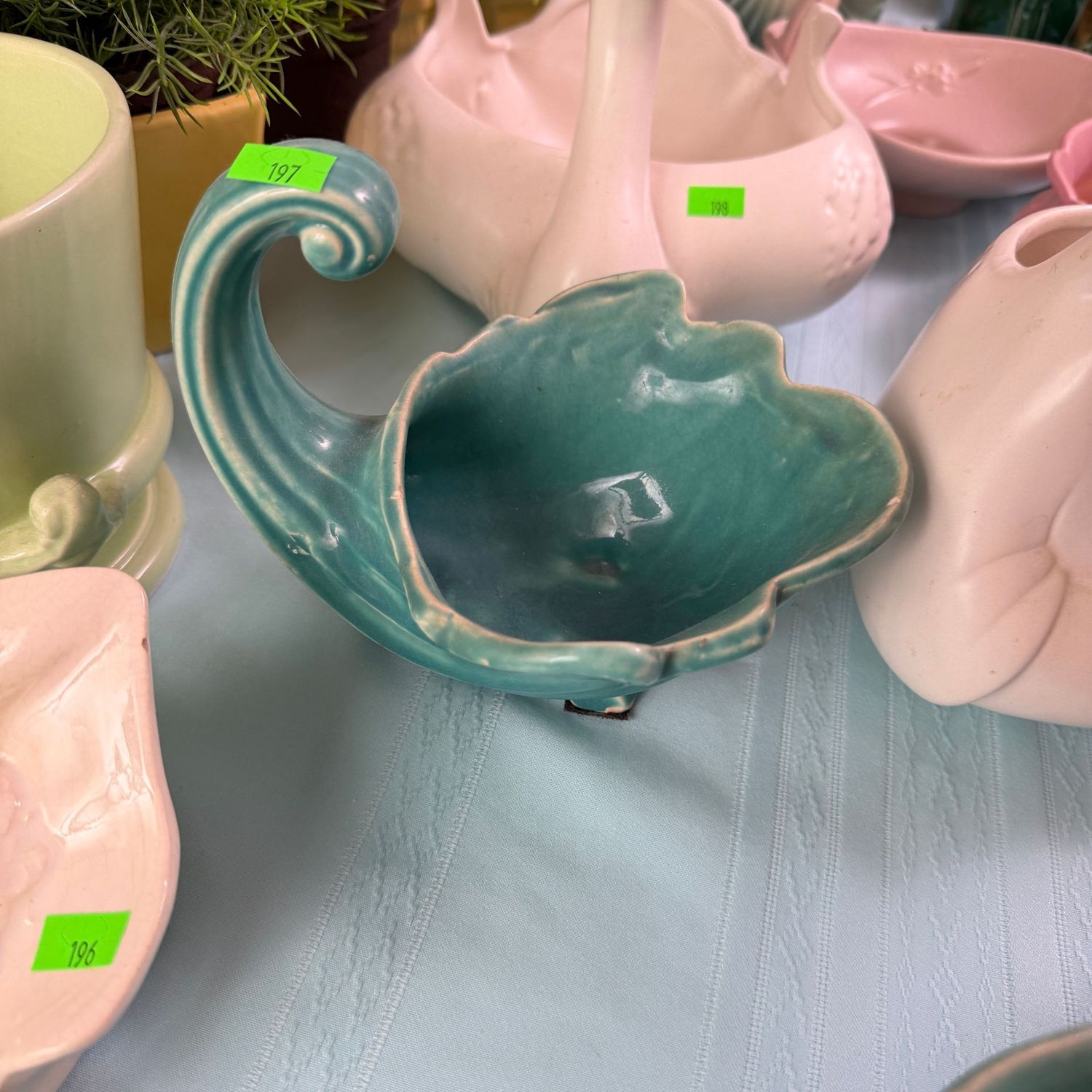 Lot #197, teal Nelson McCoy pottery cornucopia planter, 7 Lot #197, teal Nelson McCoy pottery cornucopia planter, 7"L