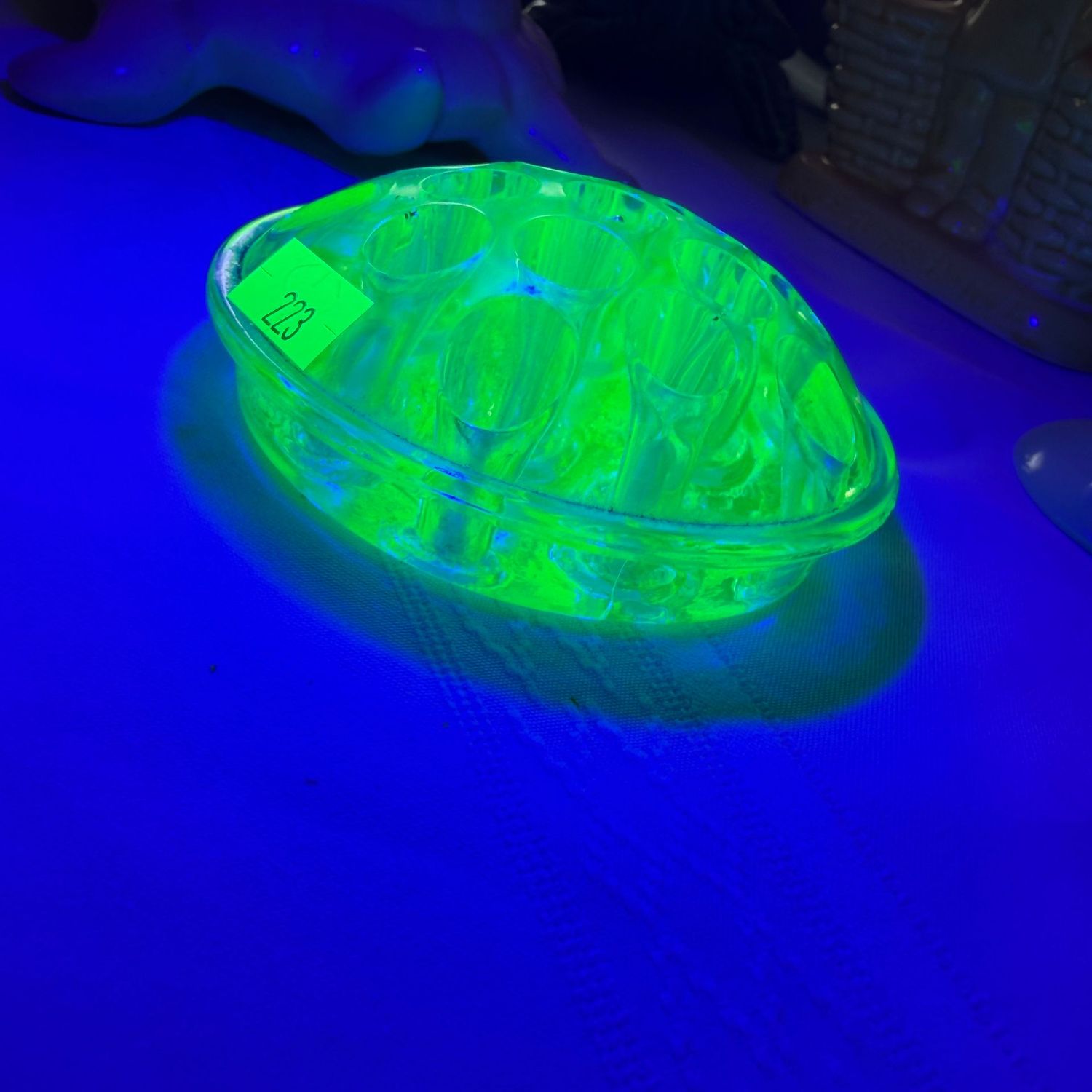 Lot #223, uranium glass flower frog, bottom measures 3.5 Lot #223, uranium glass flower frog, bottom measures 3.5"