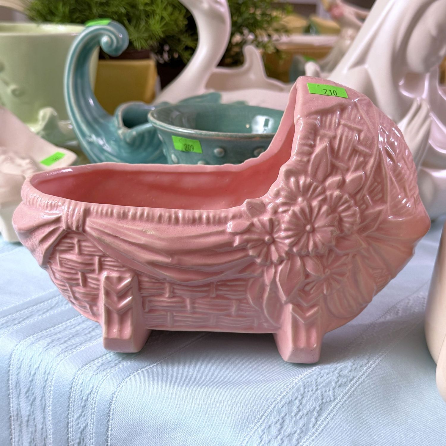 Lot #210, McCoy pottery pink bassinet, cradle planter, 7"L