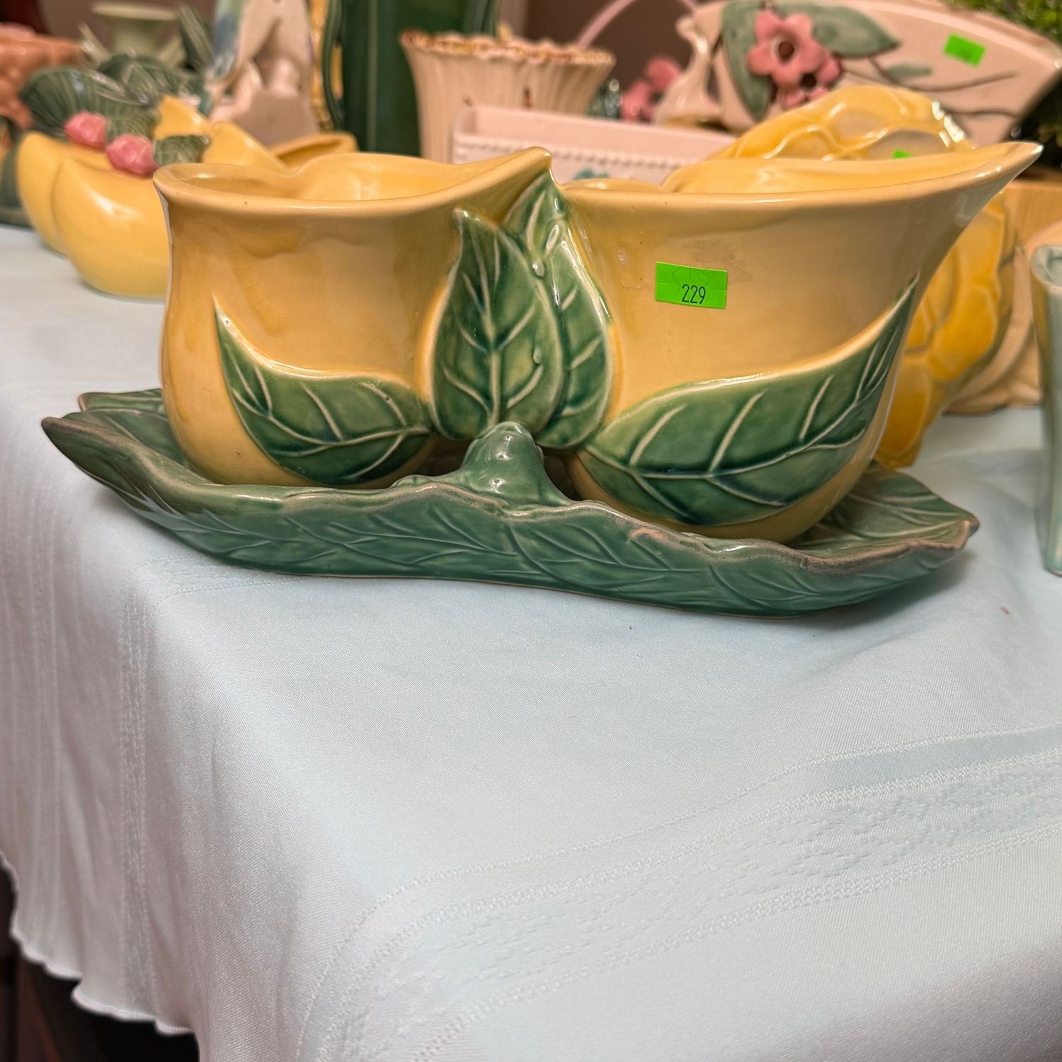 Lot #229, Morton pottery, double yellow lily planter, 11"L