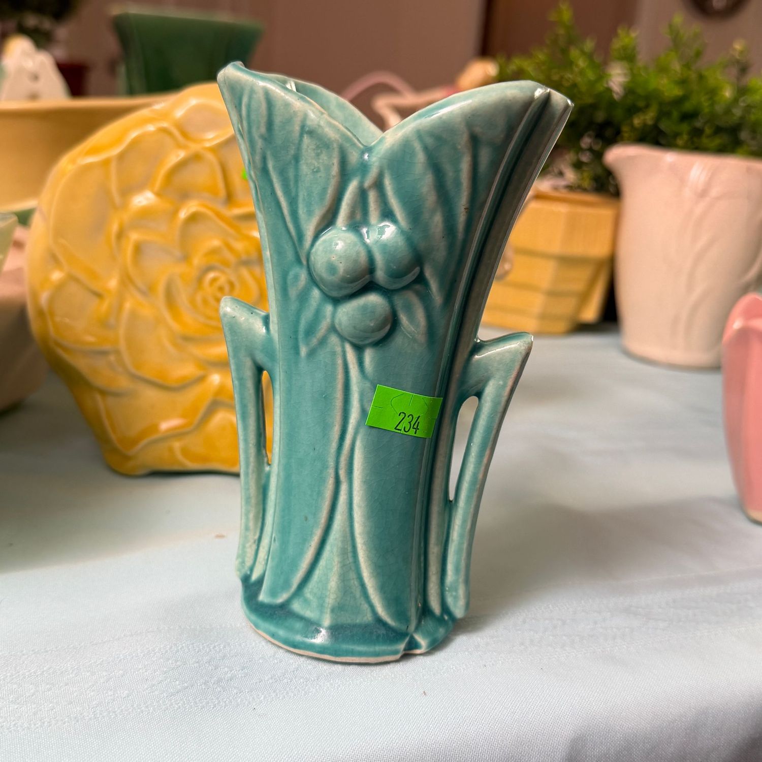 Lot #234, McCoy pottery green leaf & berry petite vase, 5"