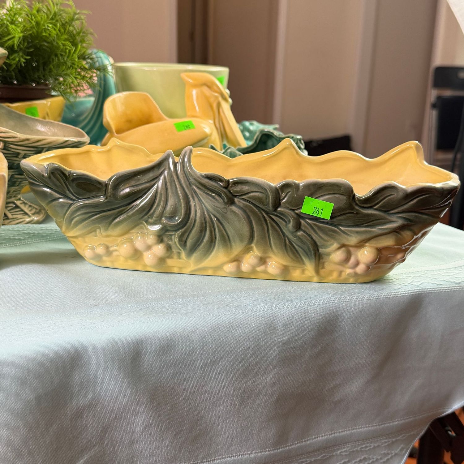 Lot #241, Hull pottery yellow and green leaf and berry planter, 12"L