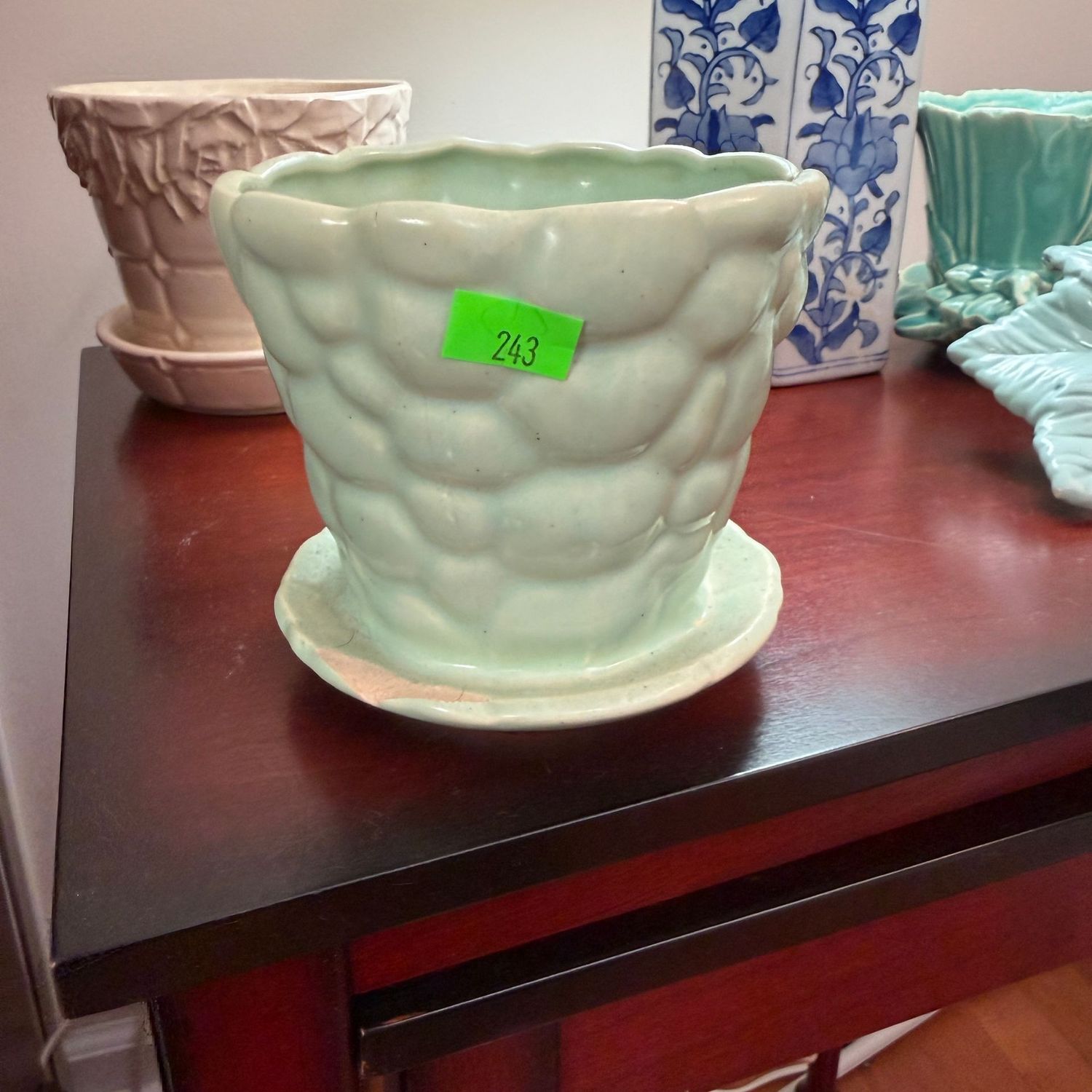 Lot #243, light green McCoy pottery pebble planter, some chips, & hairlines, 3.5"