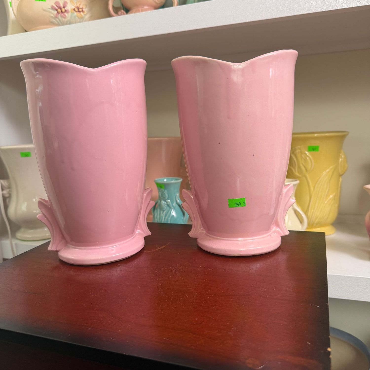 Lot #249, pair of pink McCoy pottery vases, one has some hairline, 8"