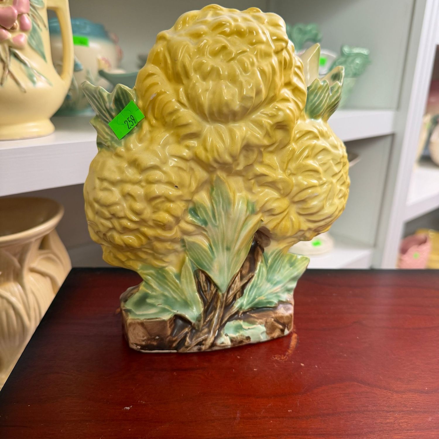 Lot #259, yellow hyacinth McCoy pottery vase, 7"