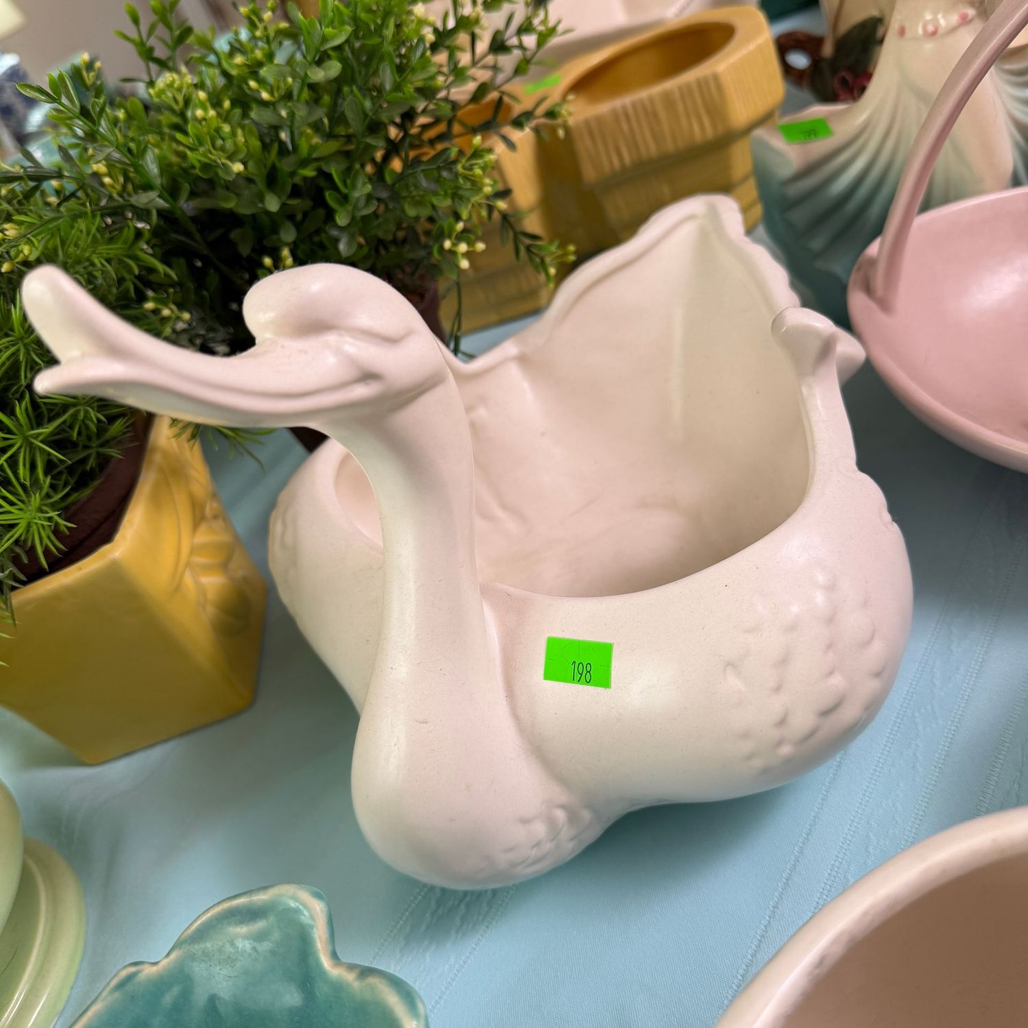 Lot #198, Hull pottery large ivory swan, mold 23, 10"L