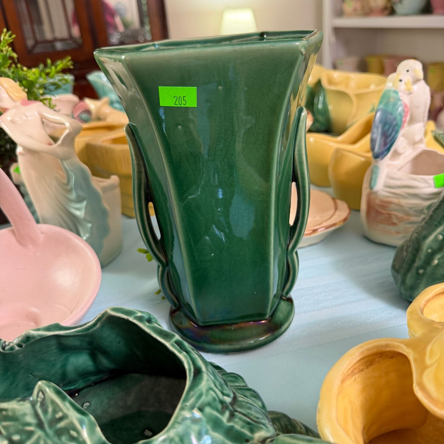 Lot #205, green McCoy pottery vase (small chips on bottom) 7"