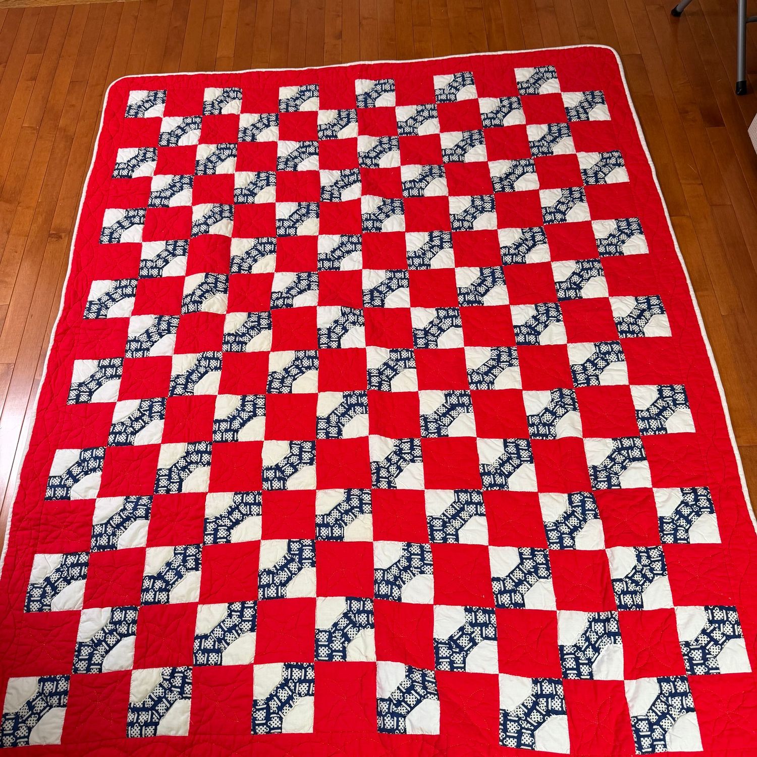 Blue bowtie quilt with red and white block background, 6'5 Blue bowtie quilt with red and white block background, 6'5" x 5'