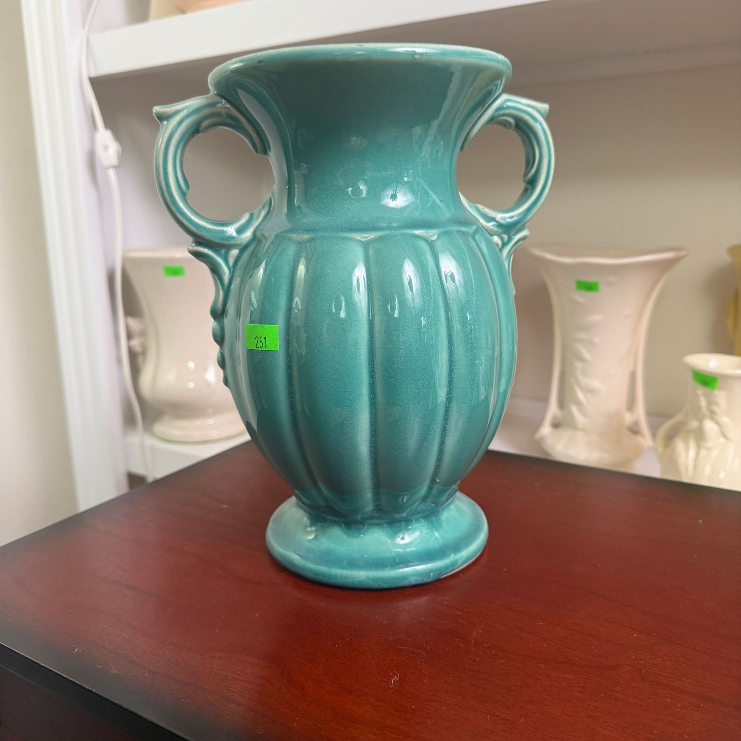 Lot #251, Aqua McCoy pottery double-handled urn vase, 8'
