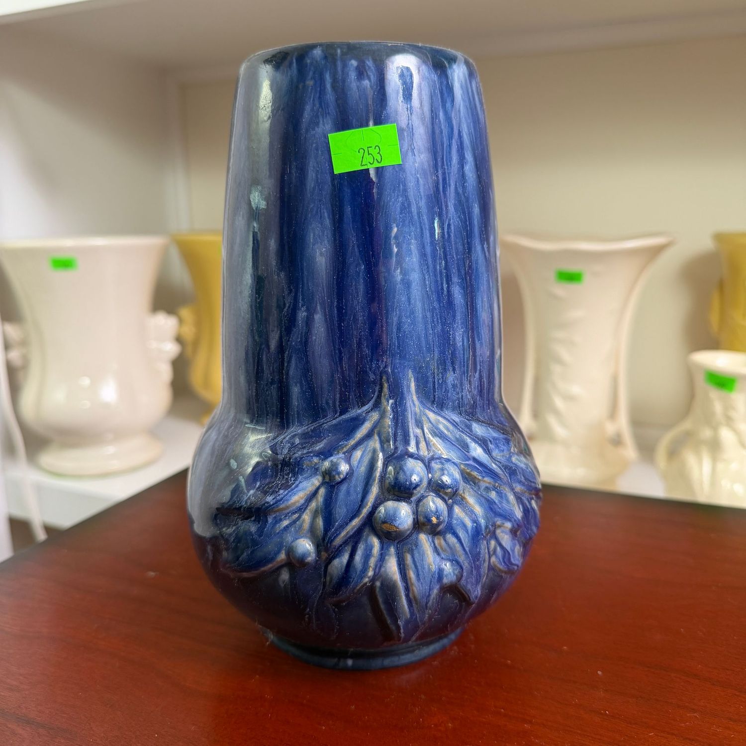 Lot #253, McCoy pottery, blue leaves & berries drip  glaze vase, 7"