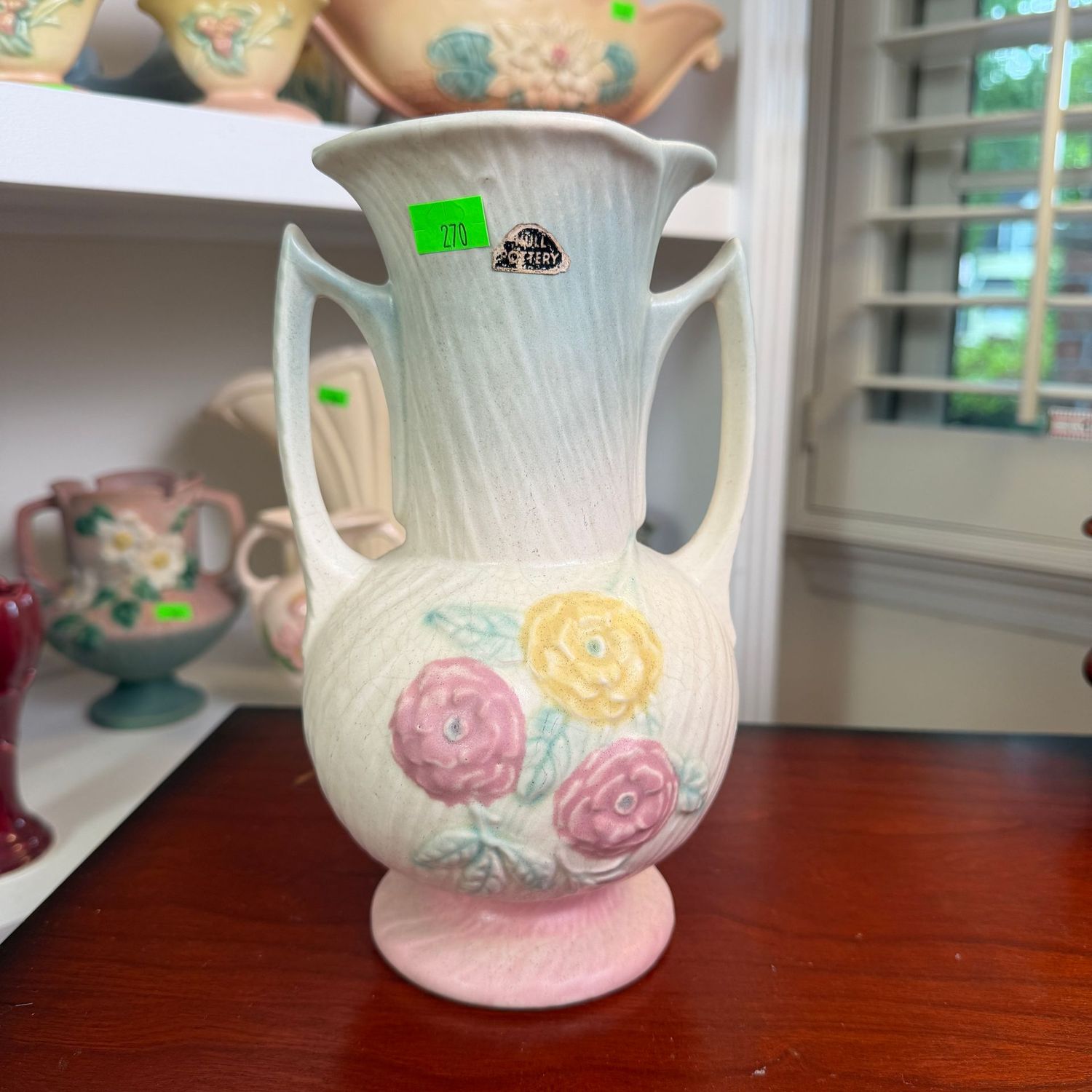 Lot #270, Hull pottery swirl/brushed Camelia, open rose, vase, with sticker, 8 1/2 Lot #270, Hull pottery swirl/brushed Camelia, open rose, vase, with sticker, 8 1/2"