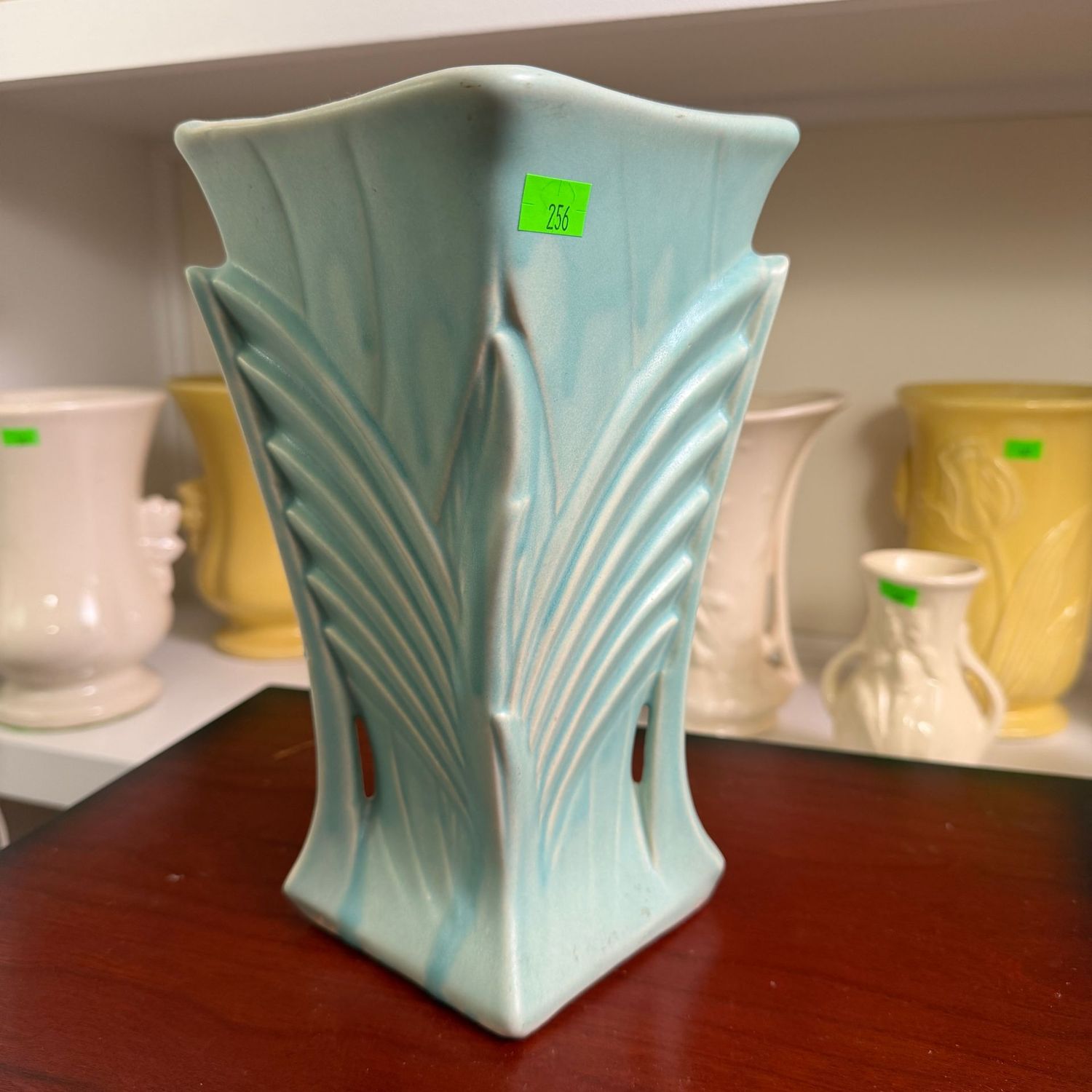 Lot #256, McCoy pottery light blue, aqua, feathered grass, fan, vase, 8"