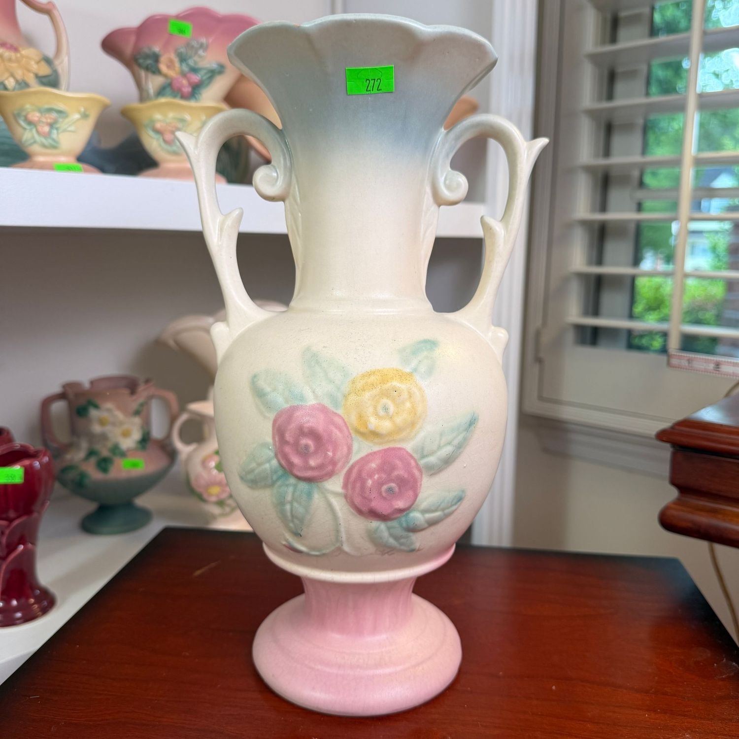 Lot #272, Hull pottery open rose, urn vase, chip at lip, 12"
