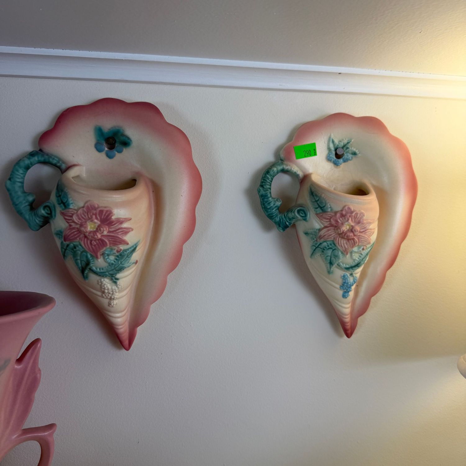 Lot #290, pair of Hull pottery woodland wall pockets, 7 1/2 Lot #290, pair of Hull pottery woodland wall pockets, 7 1/2"
