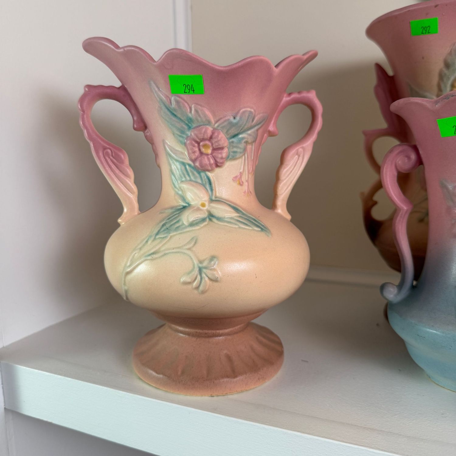 Lot #294, Hull pottery magnolia double-handle vase, 8 1/2"
