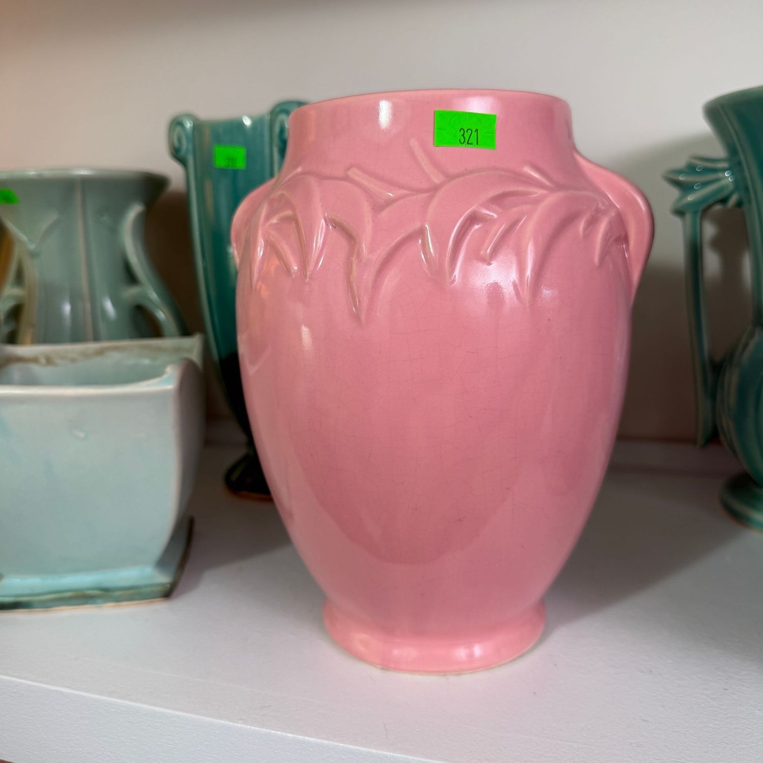 Lot #321, McCoy pottery pink vase with leafy border, 8 Lot #321, McCoy pottery pink vase with leafy border, 8"