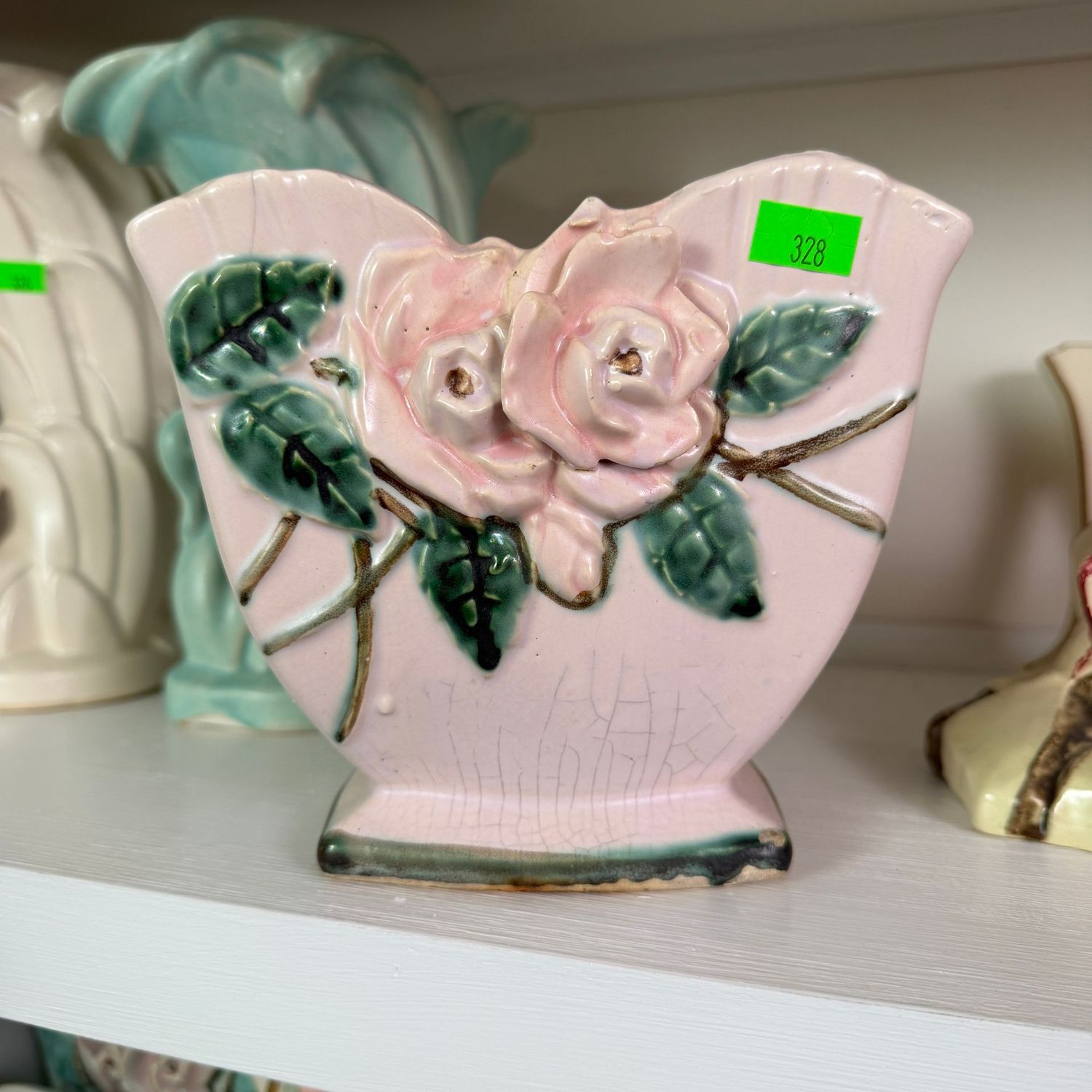 Lot #328, McCoy pottery wild rose planter, 6"