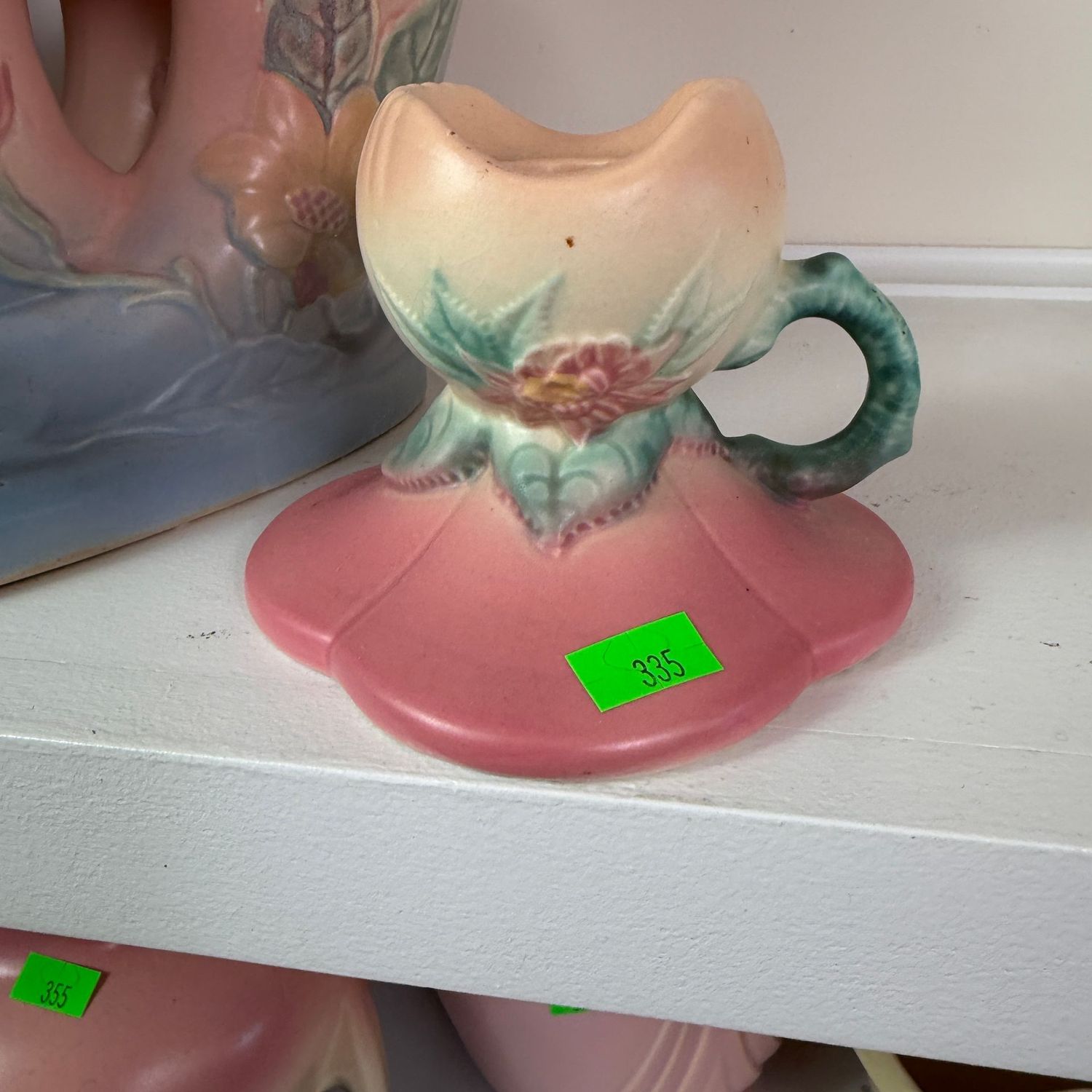 Lot #335, Hull pottery woodland candle holder, has a minor repair Lot #335, Hull pottery woodland candle holder, has a minor repair
