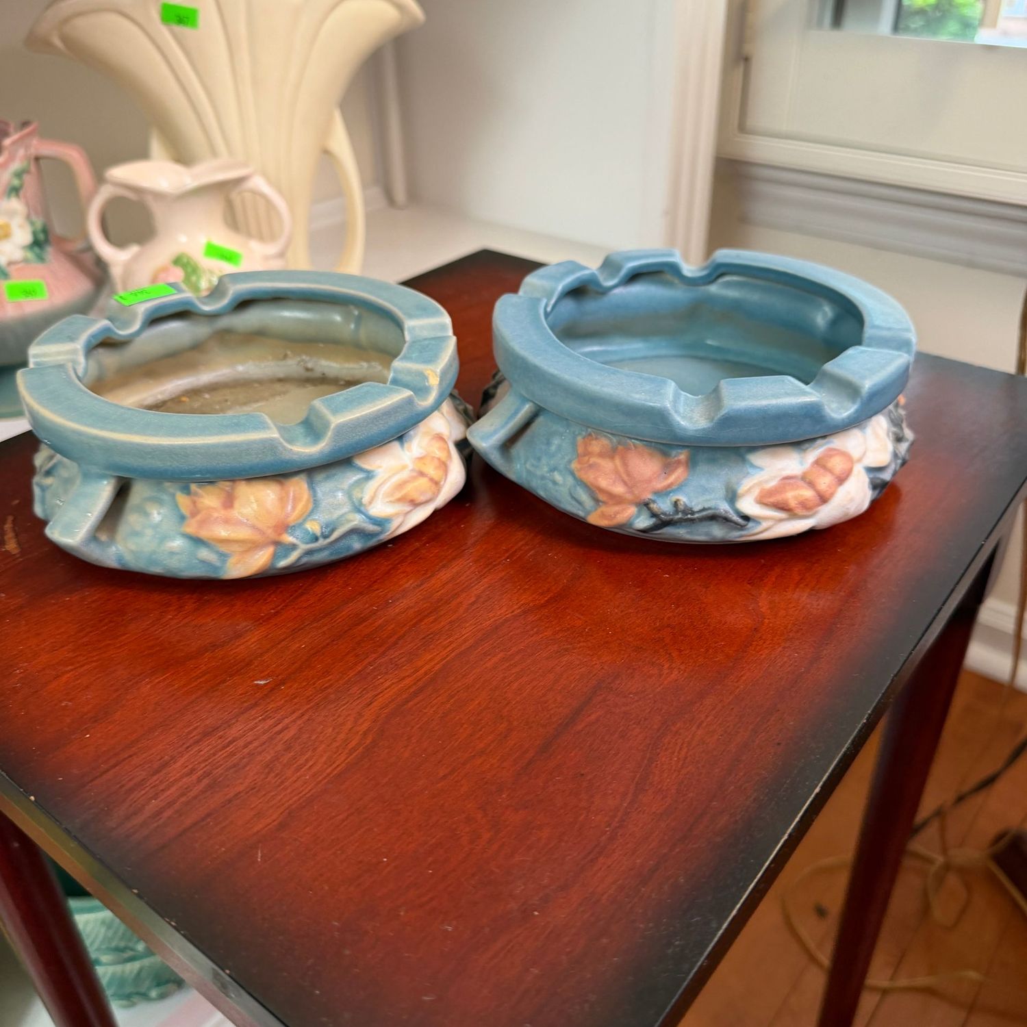 Lot #346, pair of Roseville pottery magnolia blue ashtrays, 6.5"W