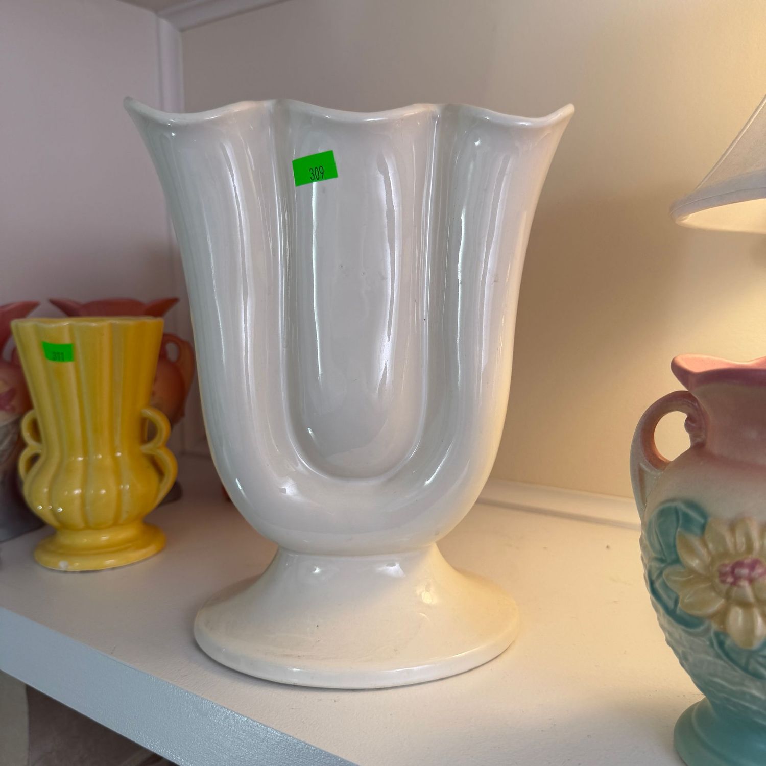 Lot #309, Hull pottery triple lobe white vase, 8.5"