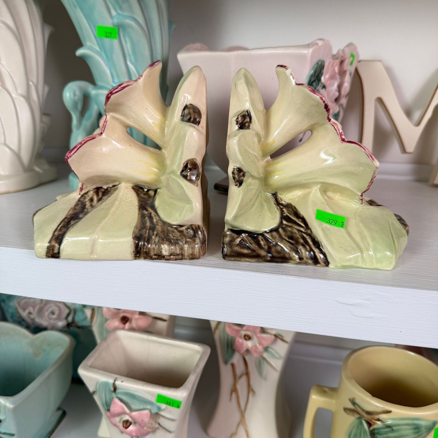 Lot #329, pair of McCoy pottery lily bookends