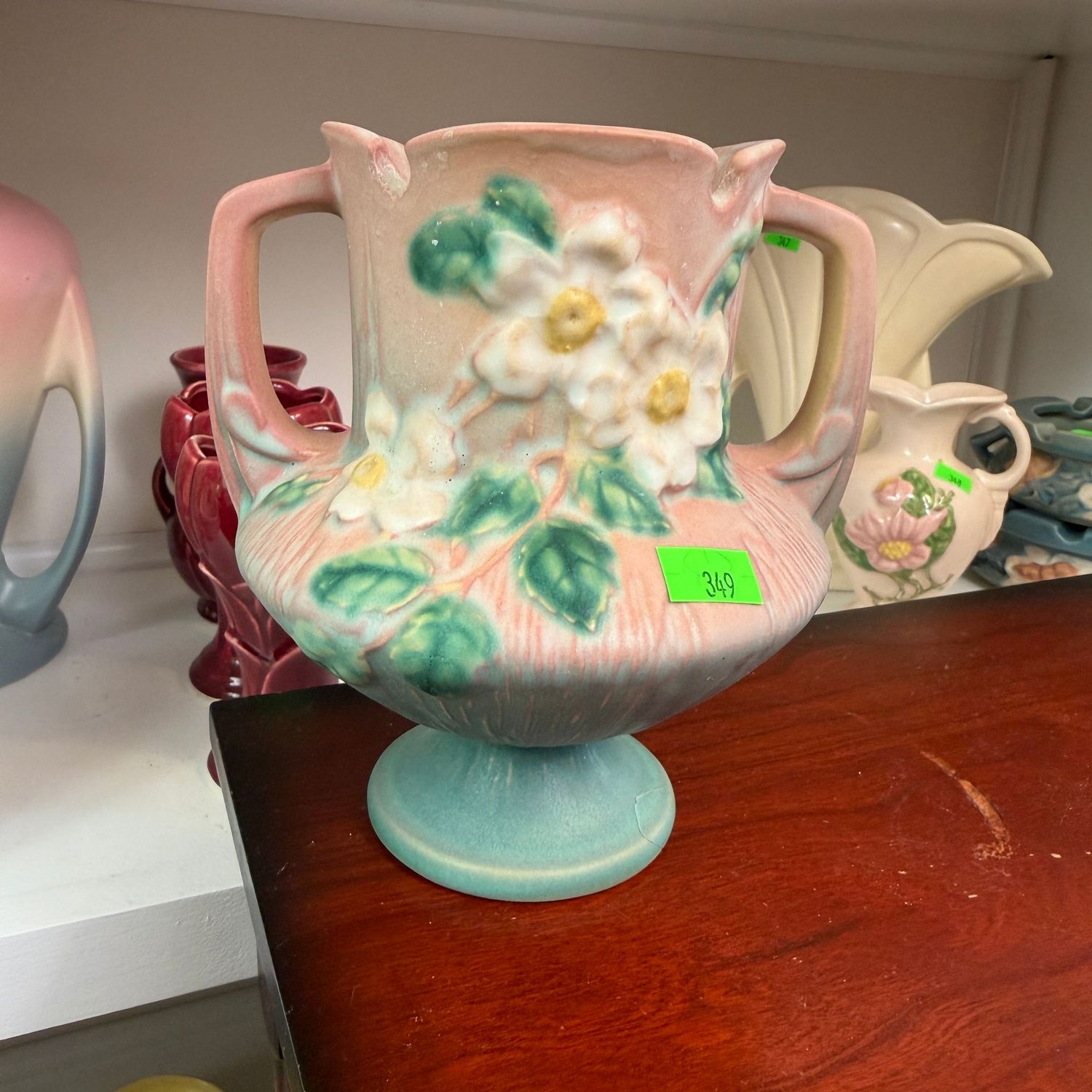 Lot #349, Roseville pottery white rose vase, minor chip on bottom, 6"