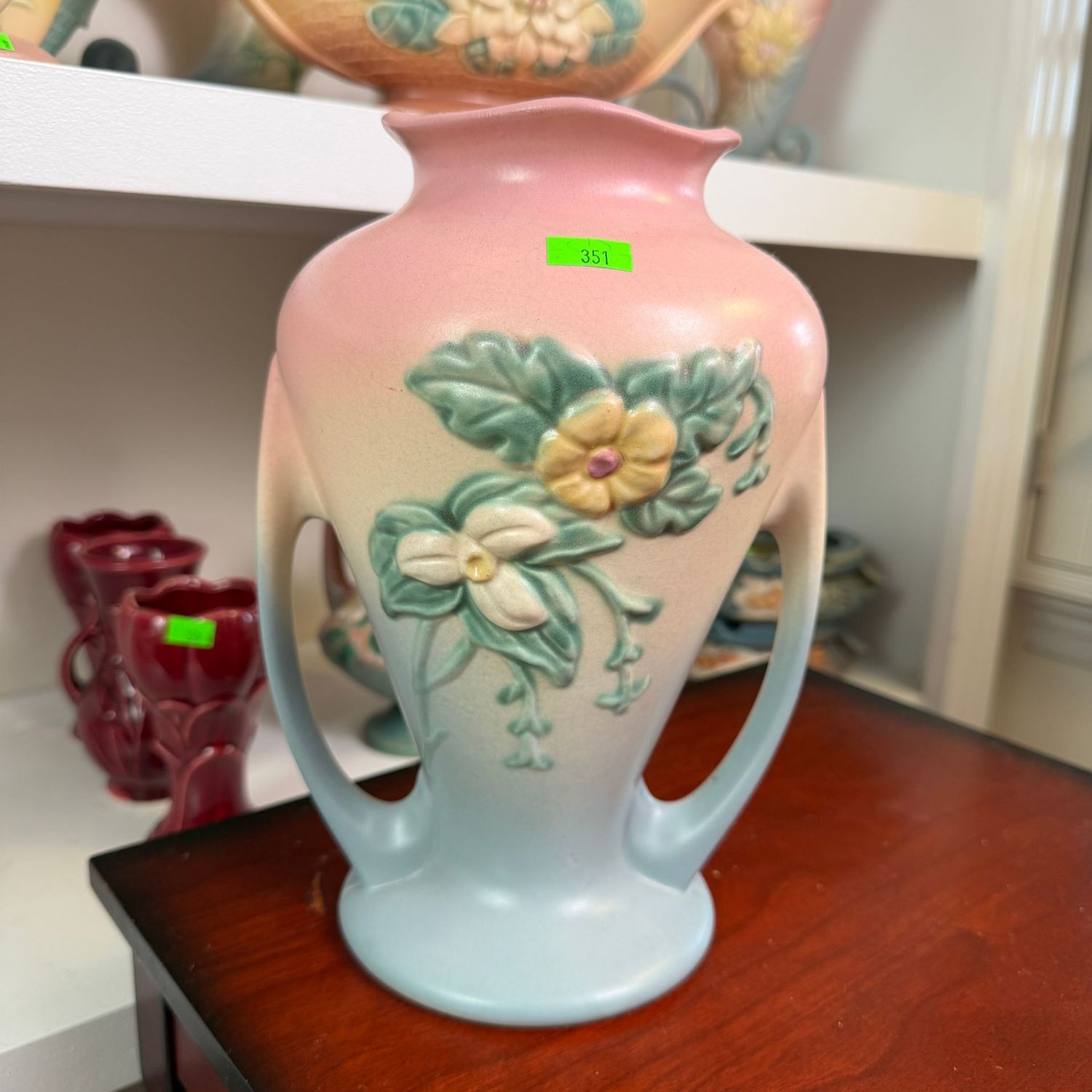 Lot #351, Hull pottery wildflower double-handled vase, (minor shrinkage hairline on bottom), 9 1/2 Lot #351, Hull pottery wildflower double-handled vase, (minor shrinkage hairline on bottom), 9 1/2"