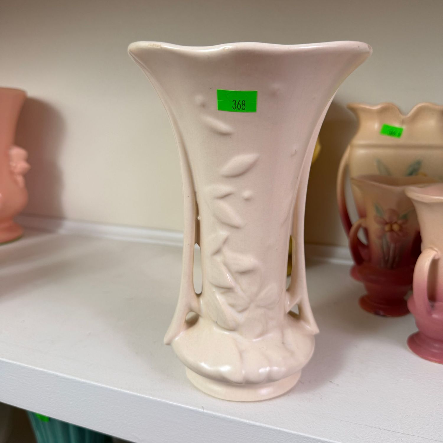 Lot #368, Nelson McCoy pottery ivory floral vase, minor rub/chip, 8.5"