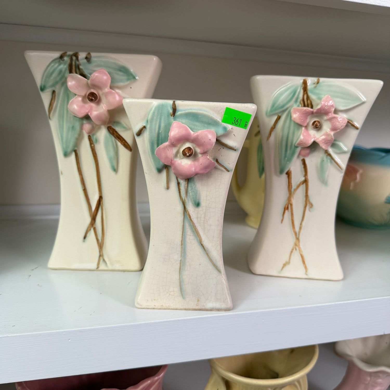 Lot #361, set of 3 McCoy blossomtime vases, a few minor hairlines, the tallest is 8"