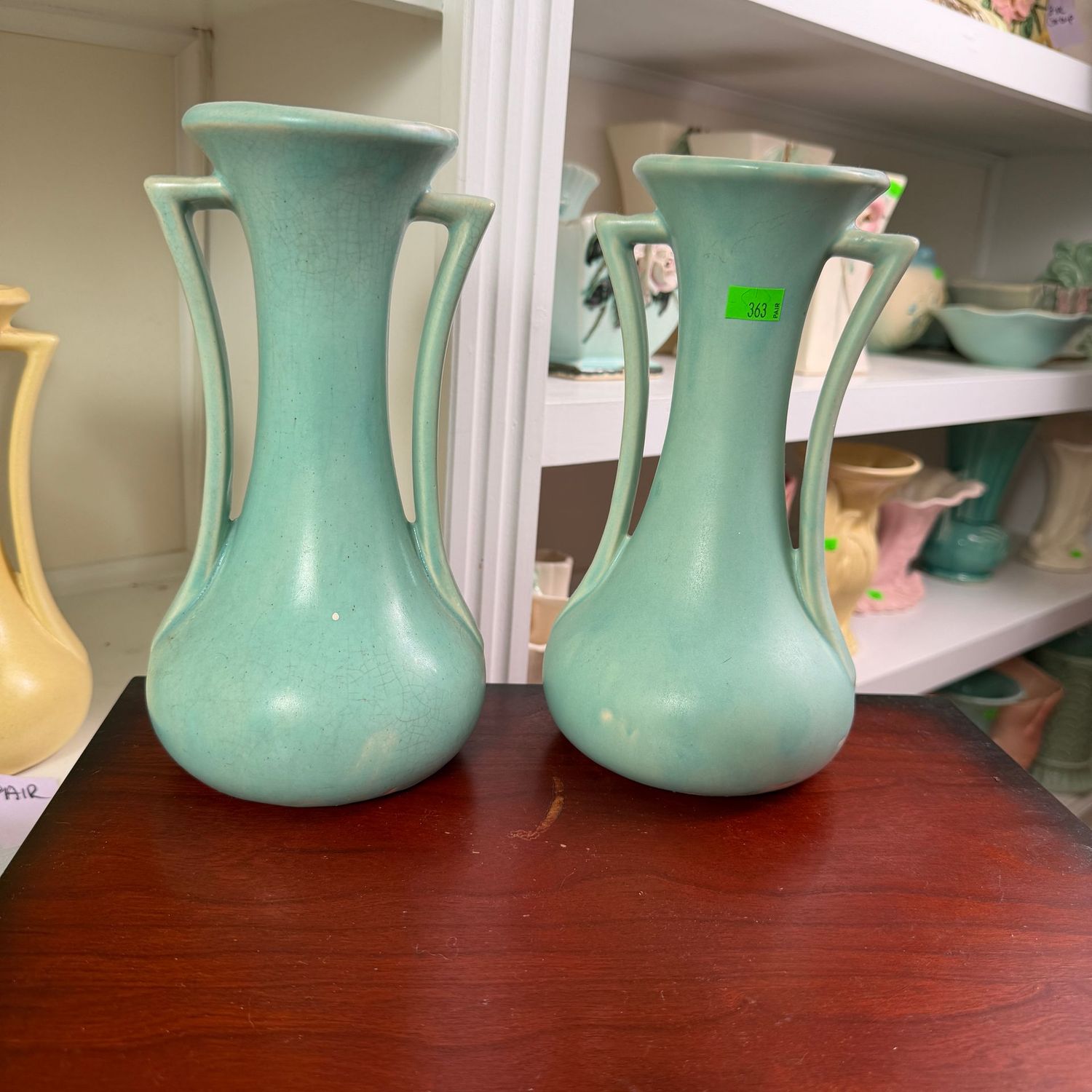 Lot #363, pair of teal USA (McCoy) pottery vases, 9"H