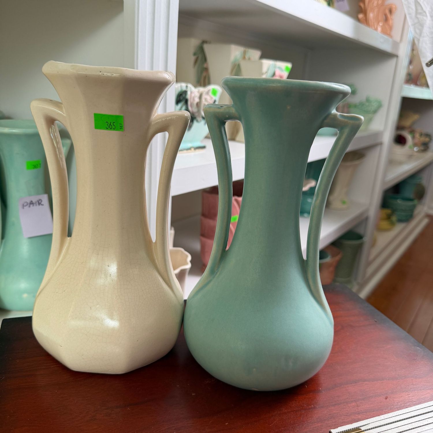 Lot #365, set of ivory and teal USA (McCoy) pottery vases, 9 Lot #365, set of ivory and teal USA (McCoy) pottery vases, 9"H