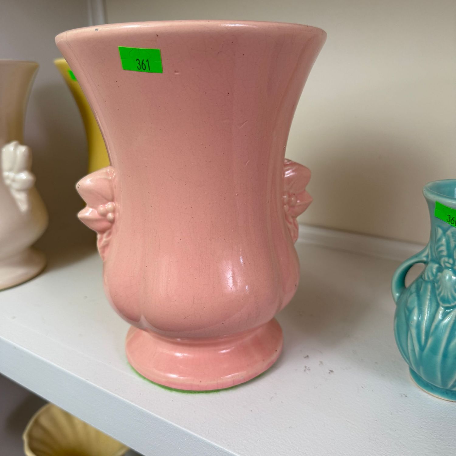 Lot #361(a), pink pottery vase with leaf & berry handles, 8.5"