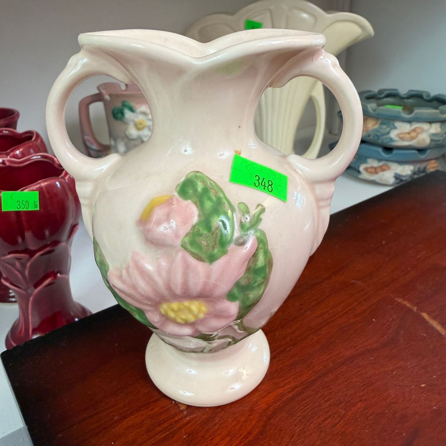 Lot #348, Hull Art pottery glossy magnolia double-handled vase, 5.5"