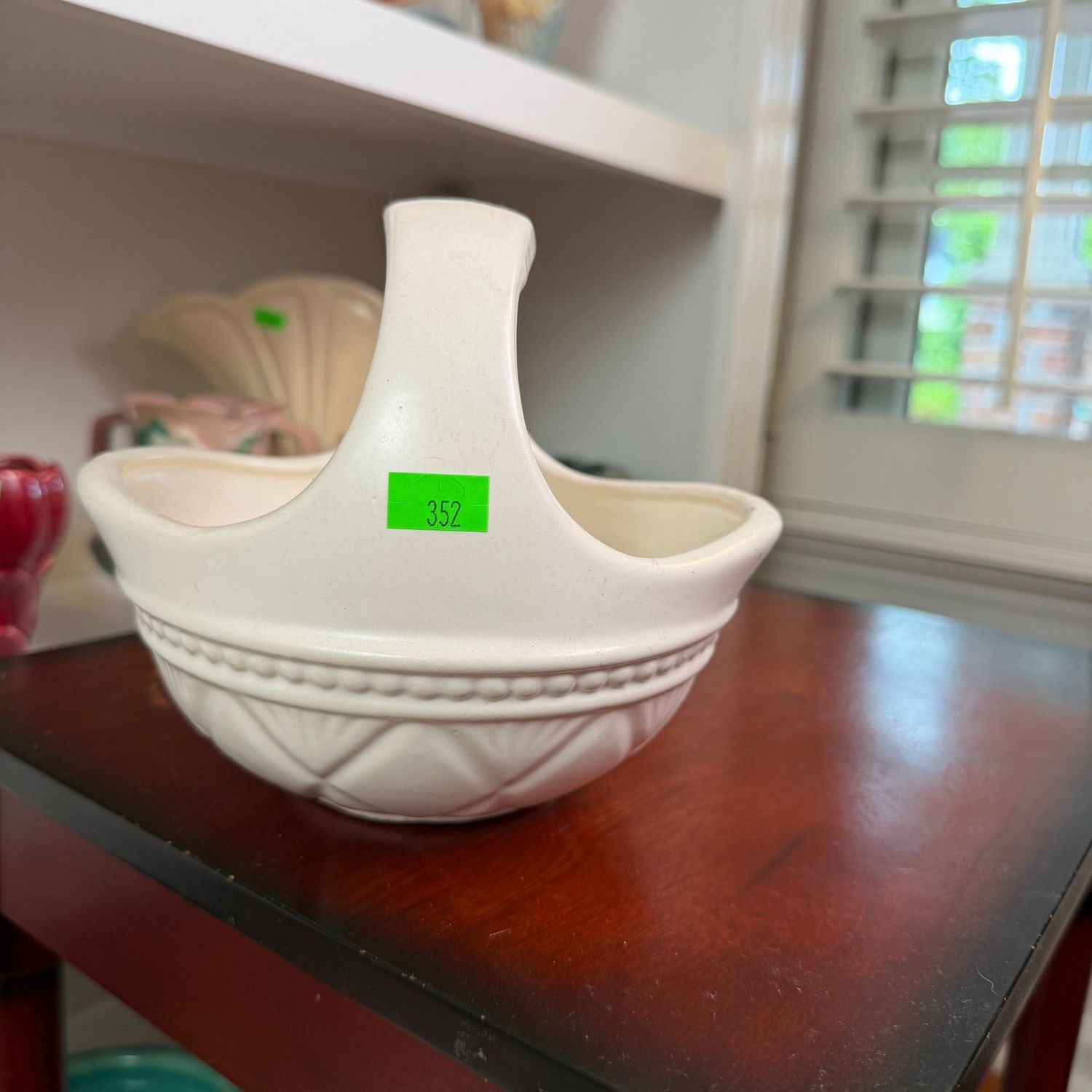 Lot #352, Hull pottery white basket planter, 7 Lot #352, Hull pottery white basket planter, 7"W