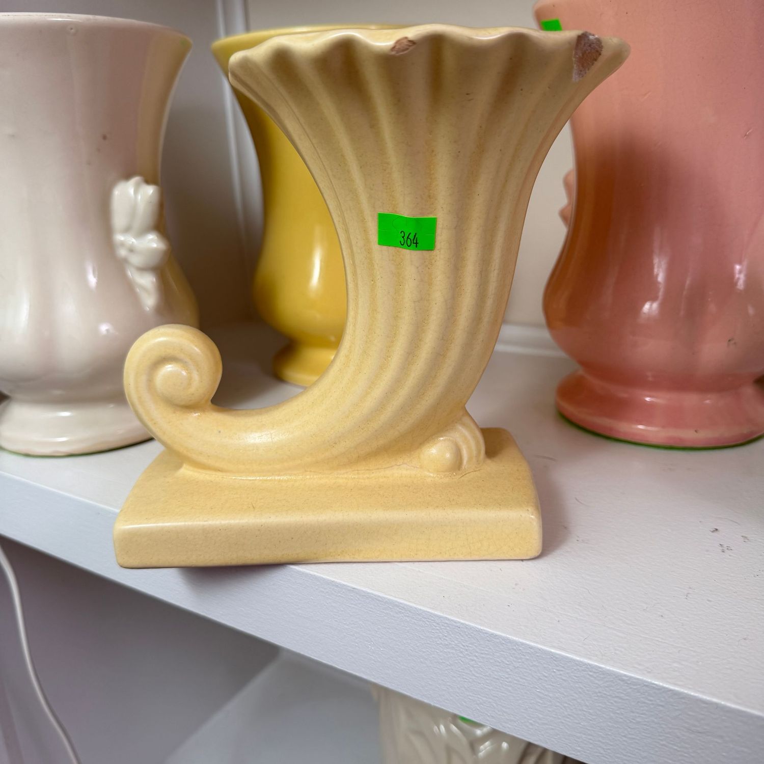 Lot #364(a), yellow McCoy pottery cornucopia planter vase, minor chips, 7"H