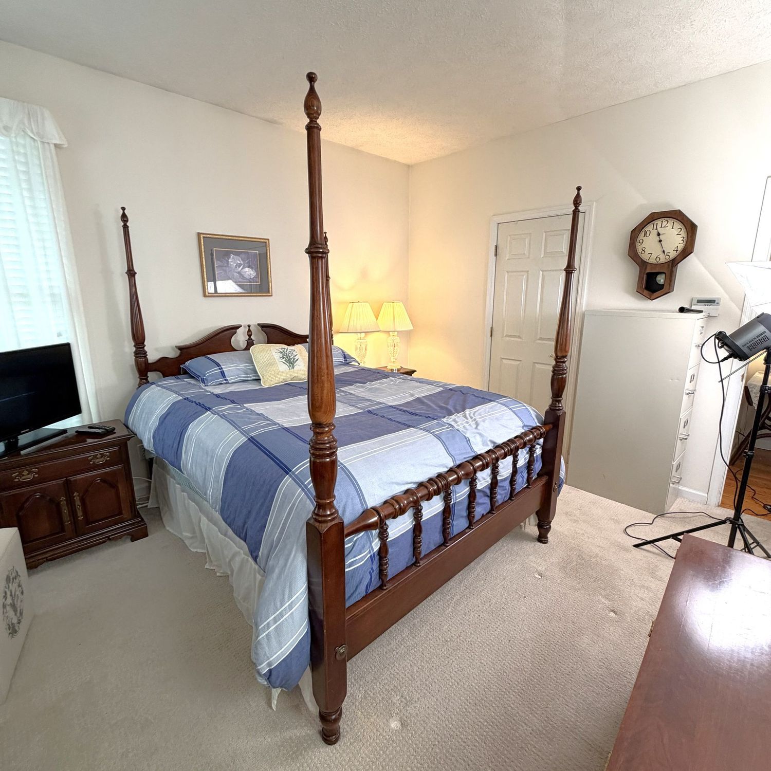 Post bed frame, likely American Drew Furniture, queen-size (has adjustment to full), metal side rails (mattress not included) posts are approx. 6-1/2 feet tall