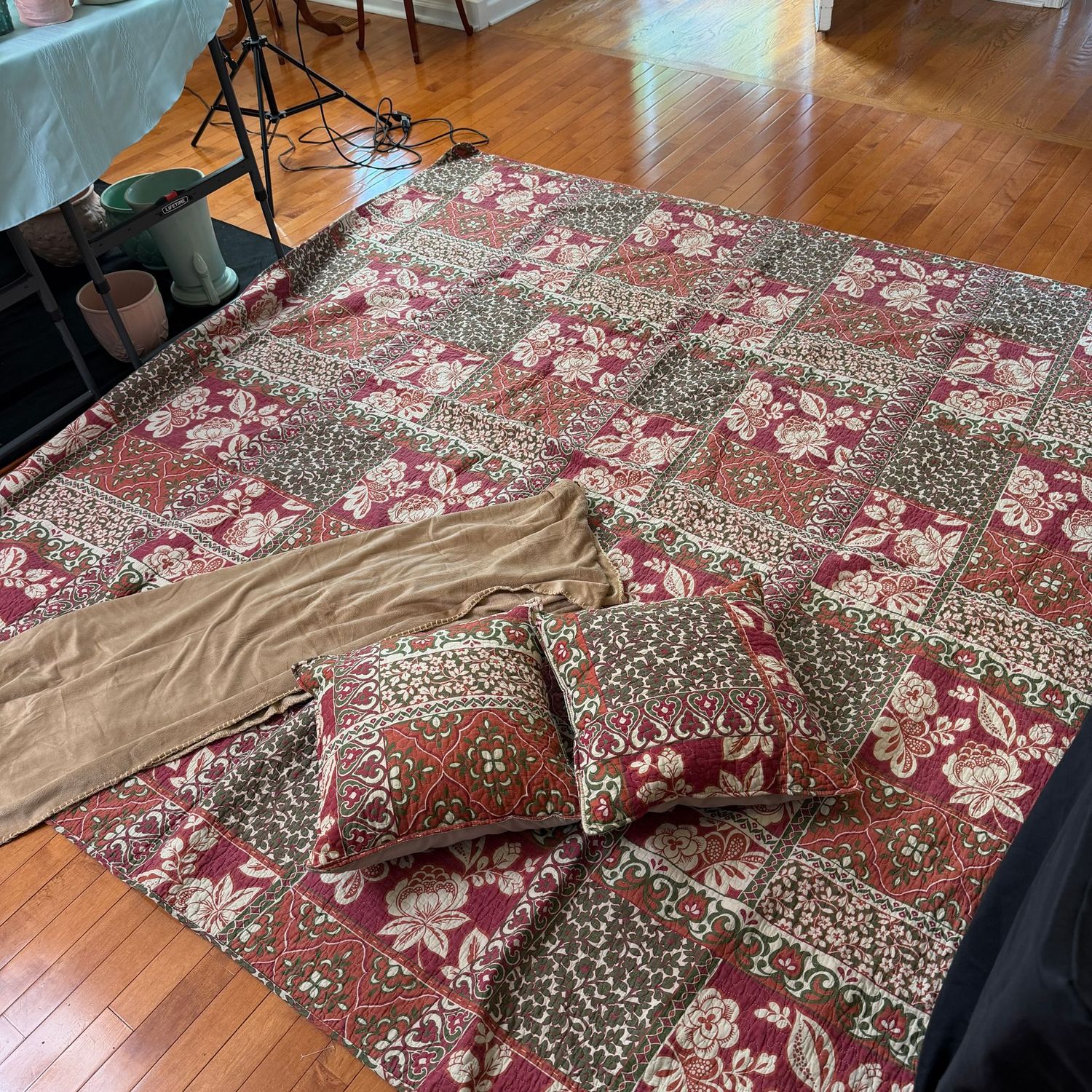 Burgundy and tan quilted bedspread, accent pillows, and throw blanket, queen-size, 7'4" x 7'4"