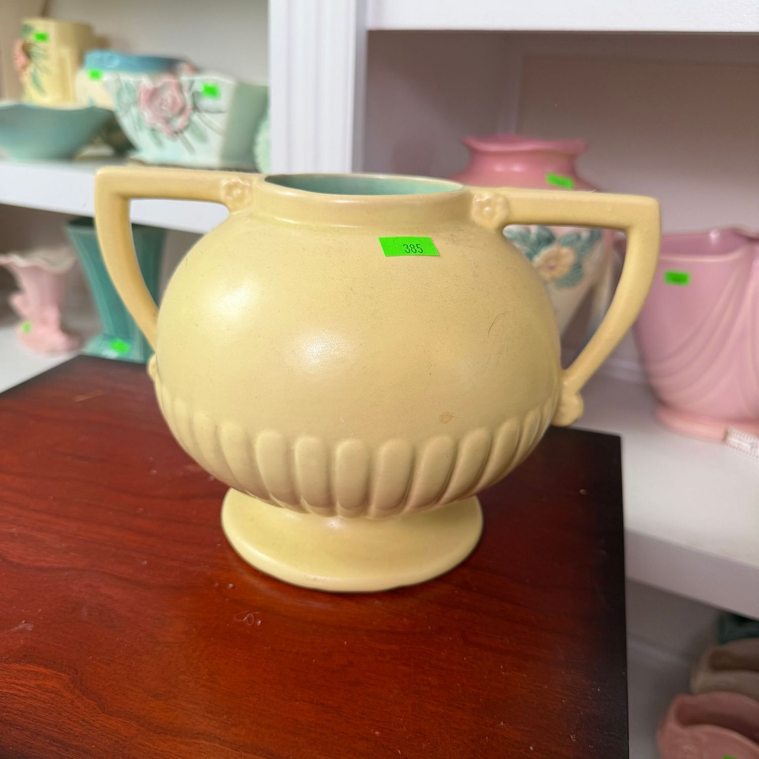 Lot #385, yellow and teal Red Wing pottery double-handled round pot, 5.25"H x 8"L