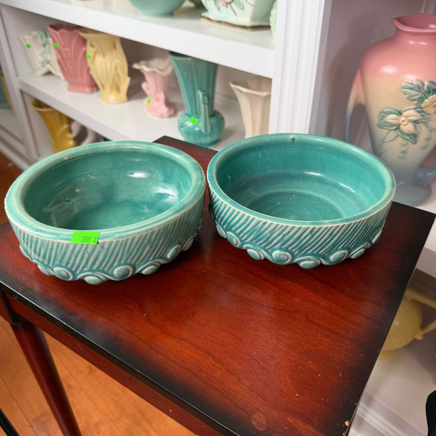 Lot #388, pair of teal McCoy pottery low planters, 2.5 Lot #388, pair of teal McCoy pottery low planters, 2.5"H x 6"W