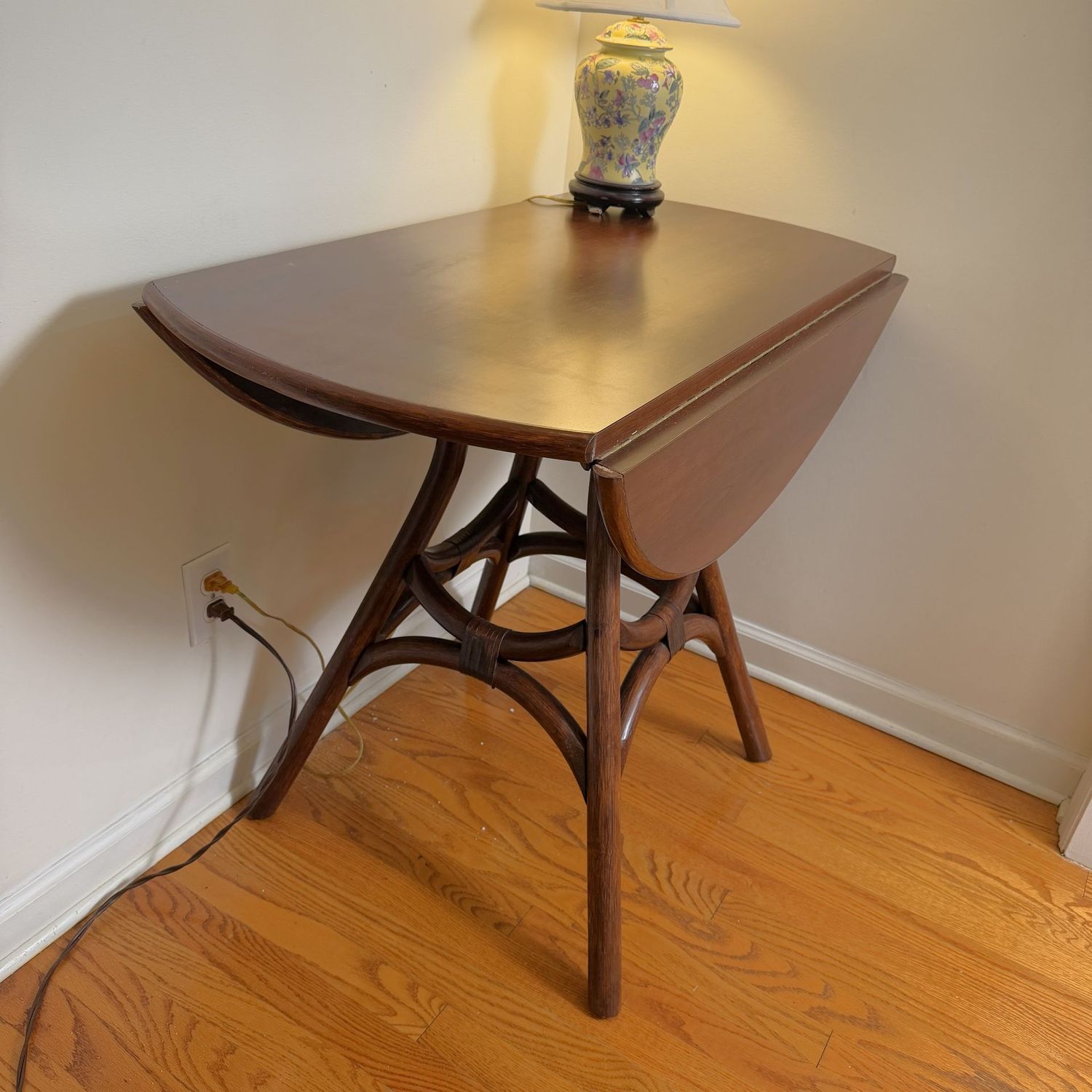 Round drop-leaf table with bentwood base, laminate top, 36"W, (18" when closed)