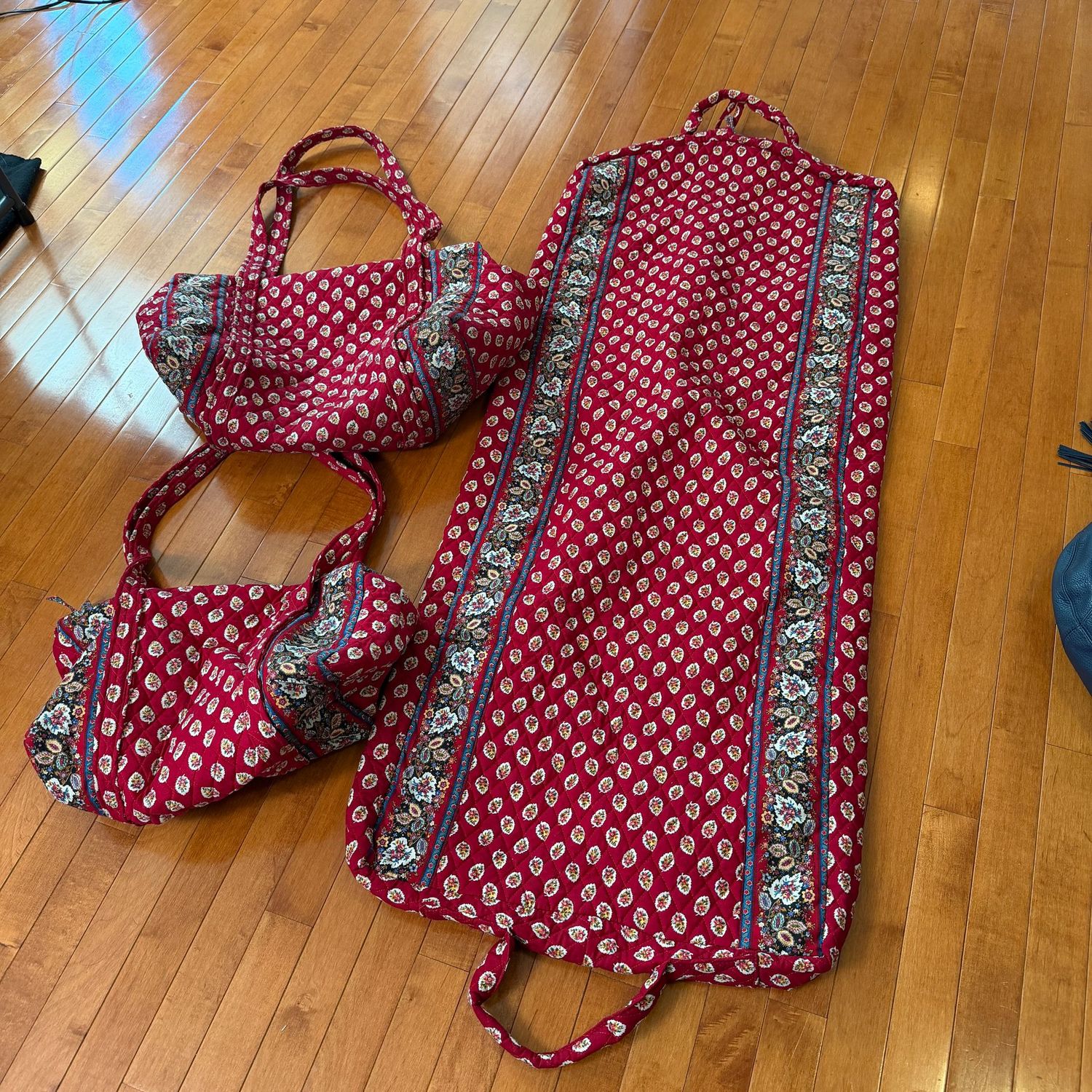 Burgundy floral quilted travel bags, minor wear Burgundy floral quilted travel bags, minor wear