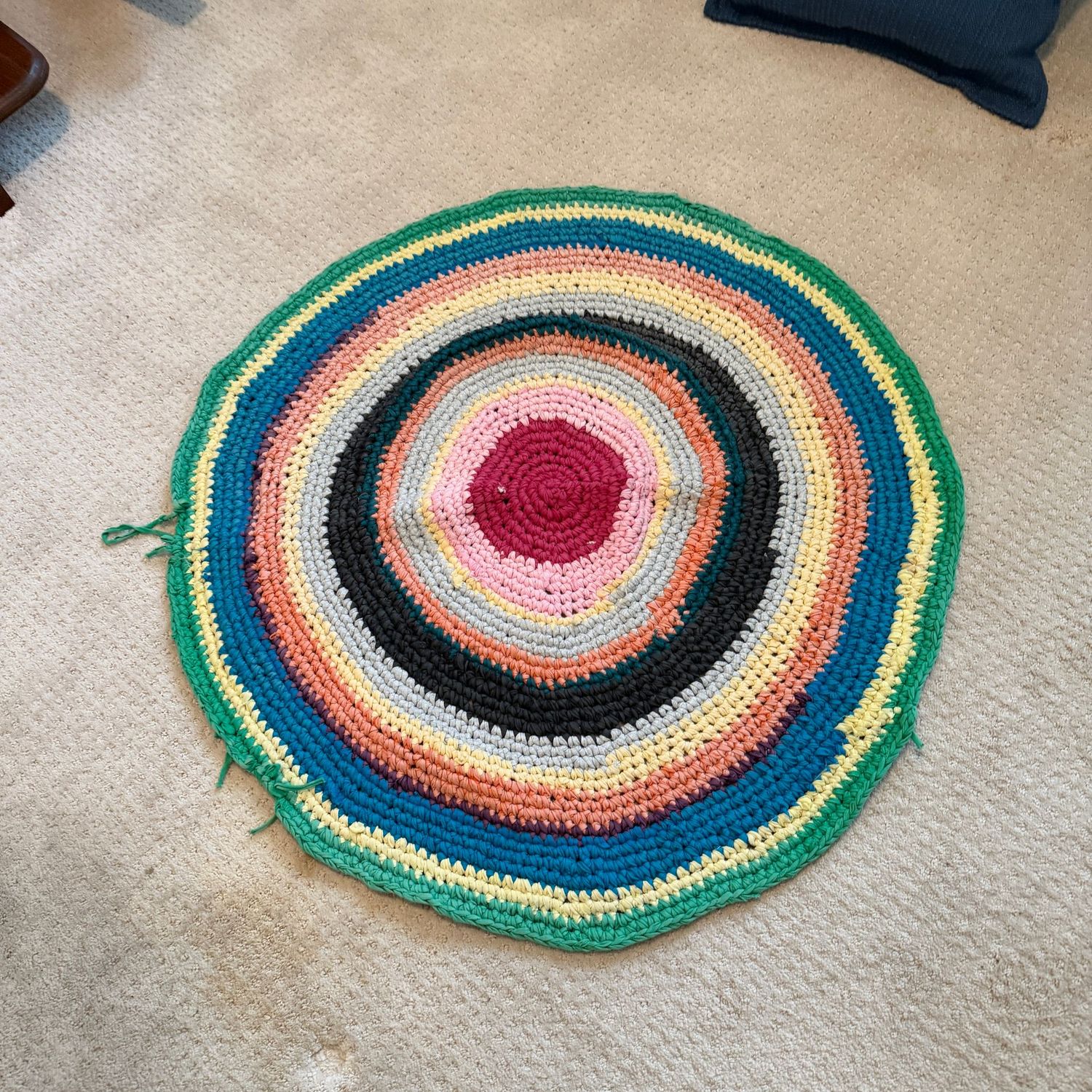Hand-made round rug, some pulls, 32"
