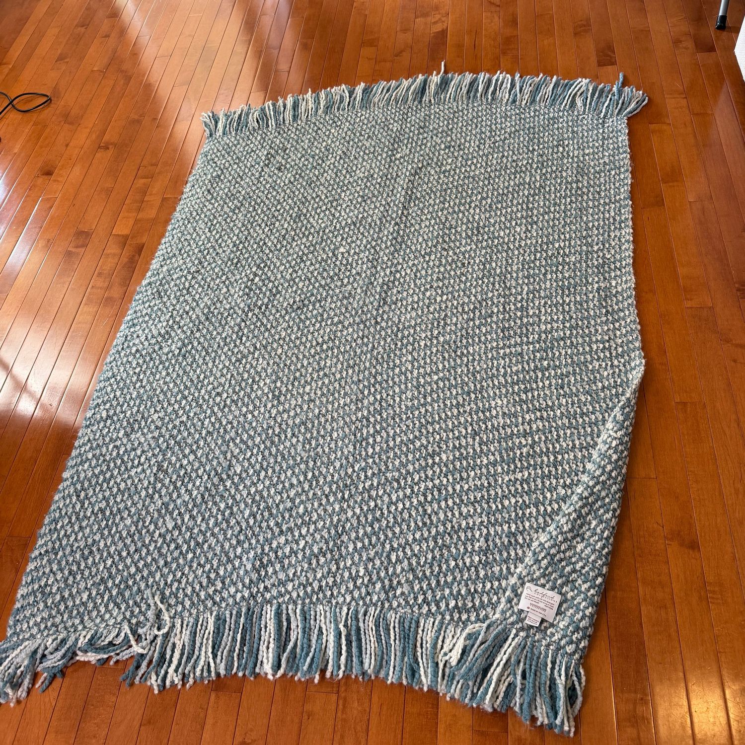 Fringed teal/blue and cream throw blanket Fringed teal/blue and cream throw blanket