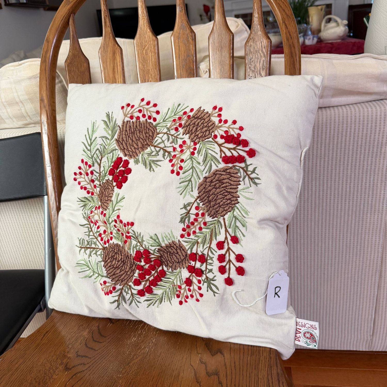 Pillow R - cream embroidered pine wreath, 17"