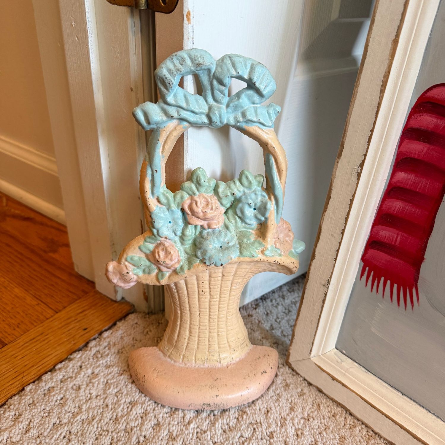 Cast iron basket doorstop, 10"