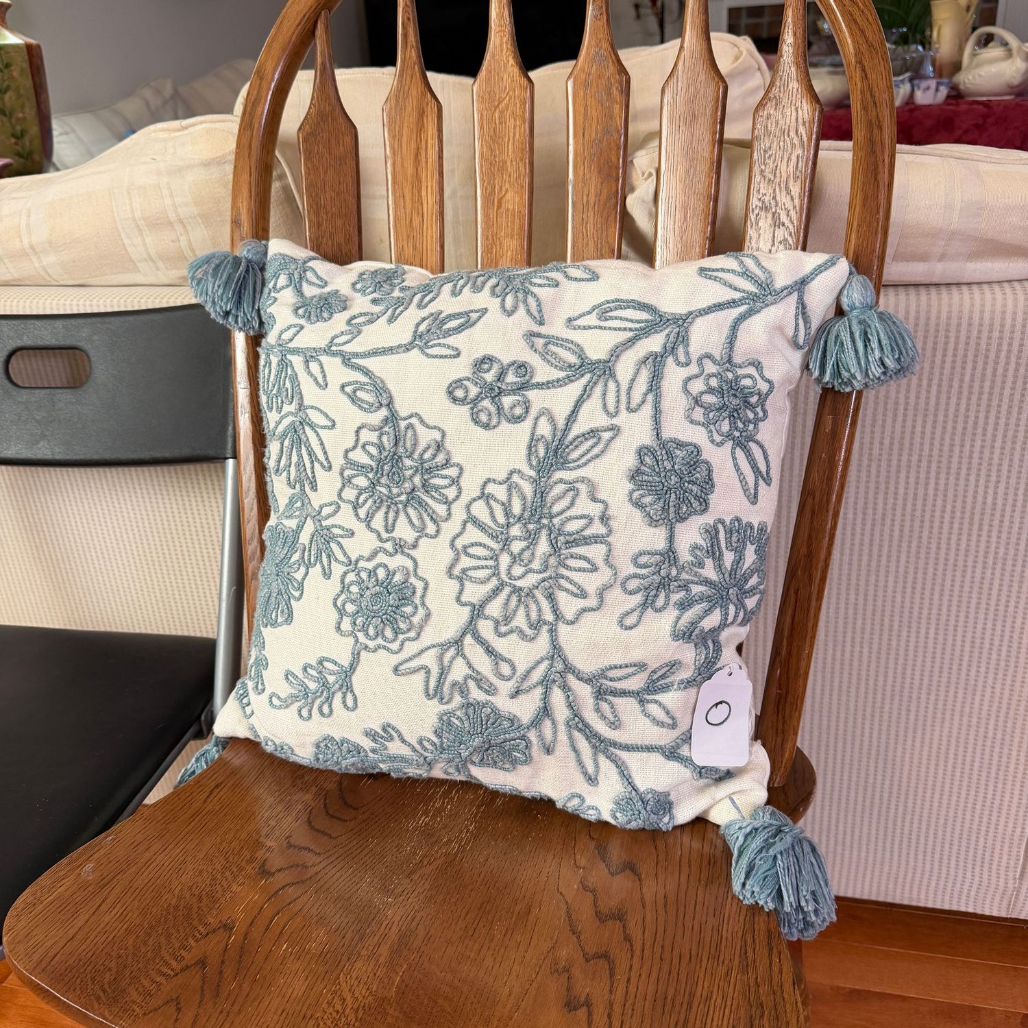 Pillow O - ivory and light blue embroidered floral, tassels, minor spot on back, 16 Pillow O - ivory and light blue embroidered floral, tassels, minor spot on back, 16"